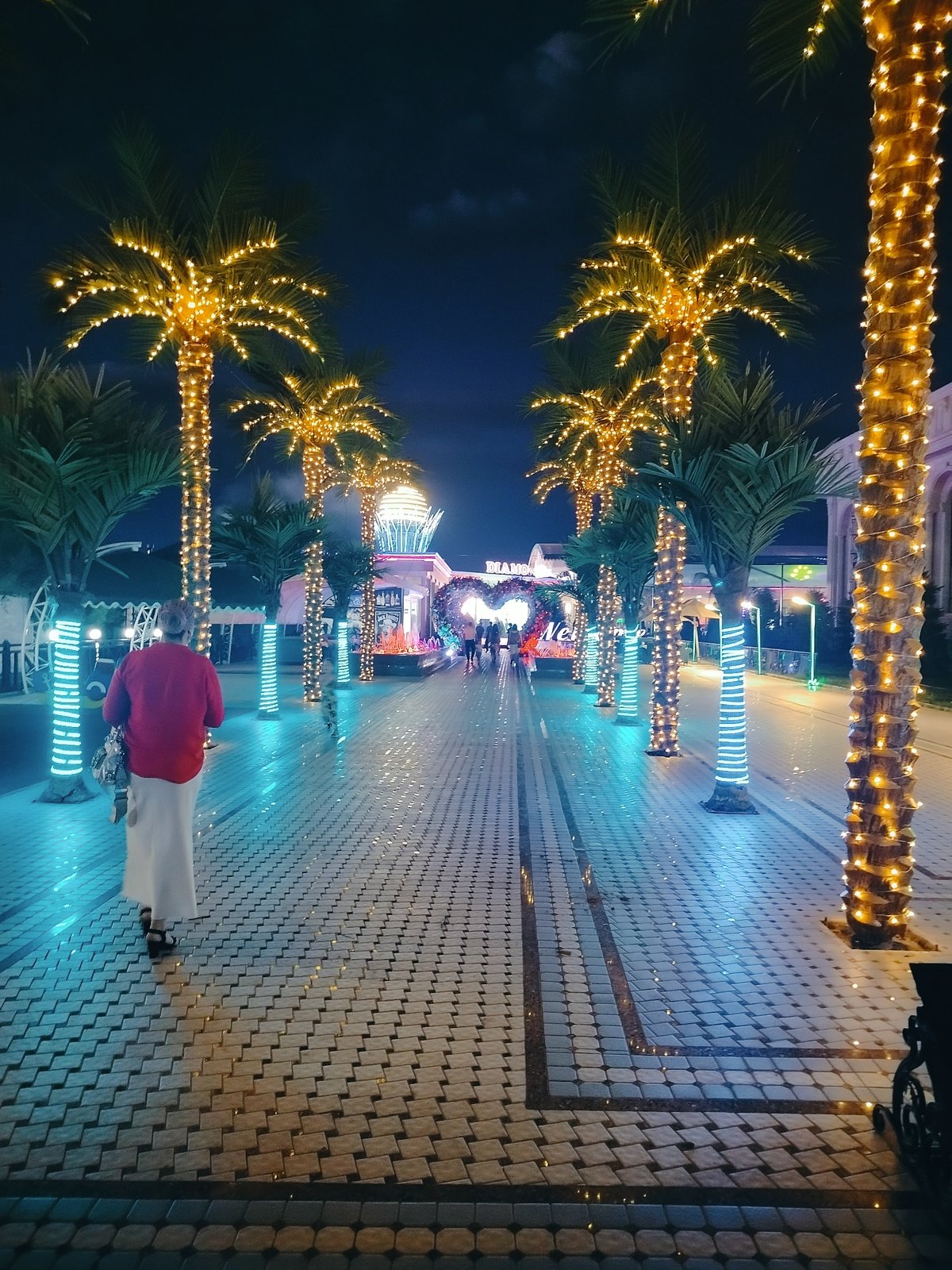 Aksukent's nightlife strip lit up after dark