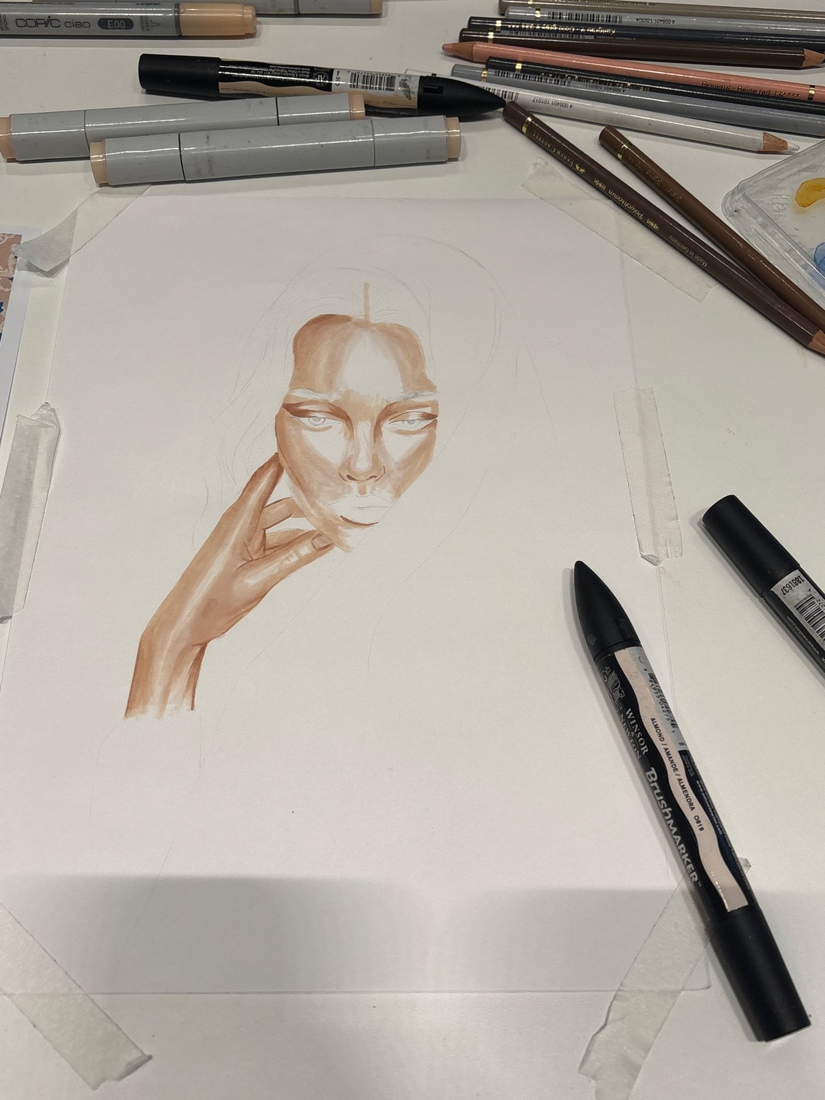 Artist works on portrait drawing in Milan studio