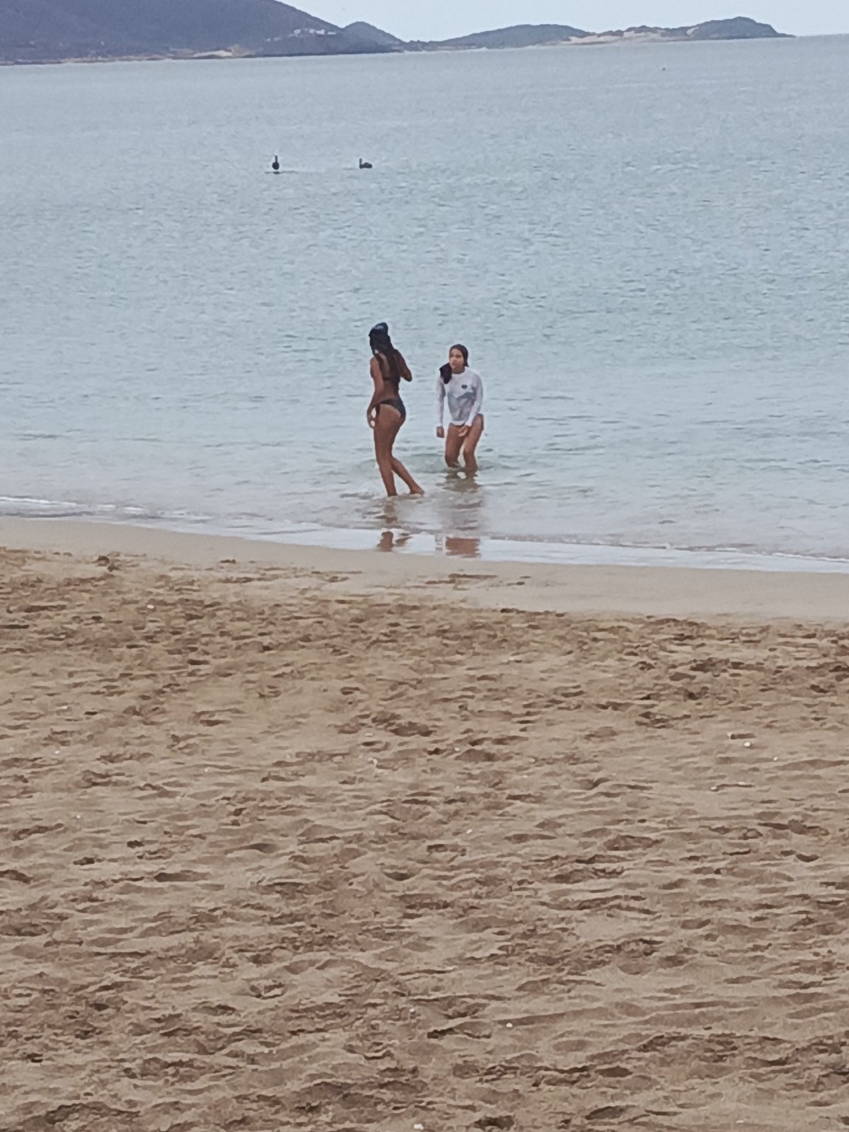 Evening beach activities documented at Juan Griego, Venezuela