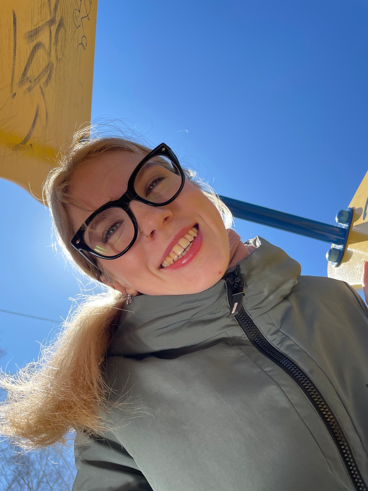 Family enjoys spring morning with dandelions in Izhevsk park