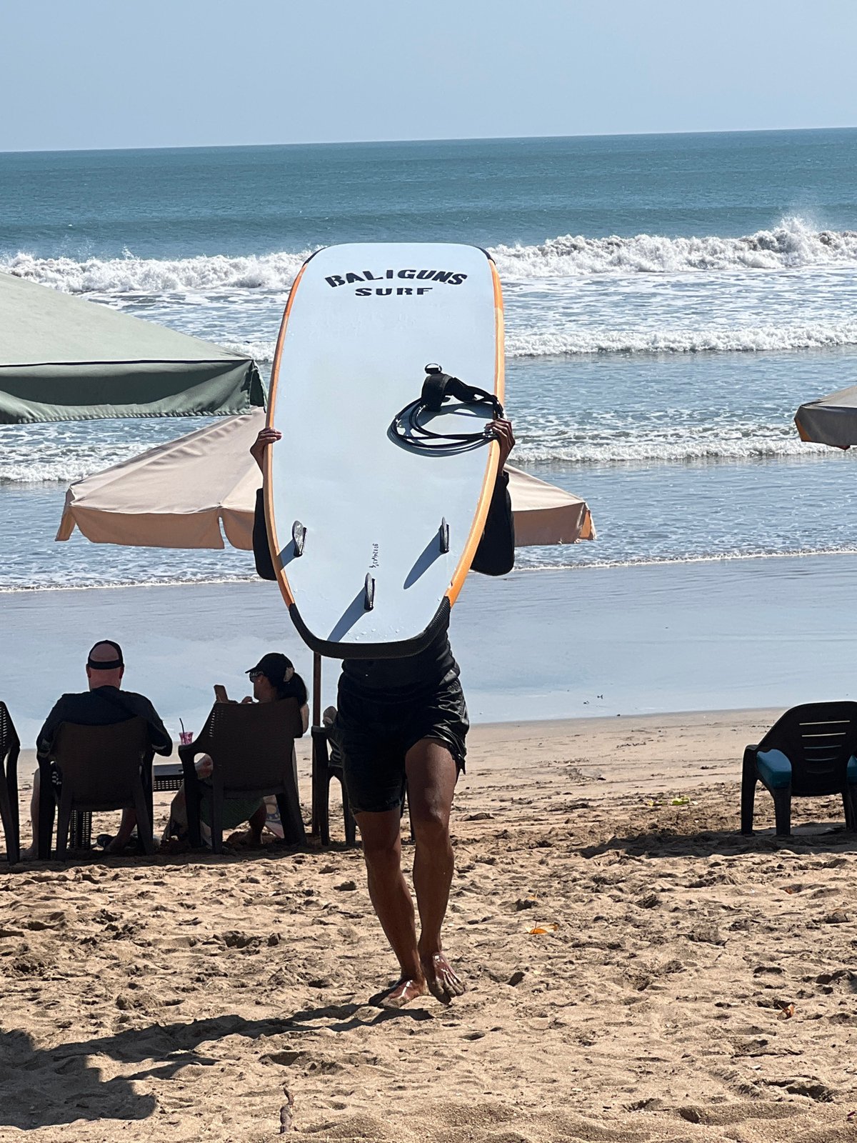 Kuta Beach morning: surfboards, ocean views, and beachside braiding
