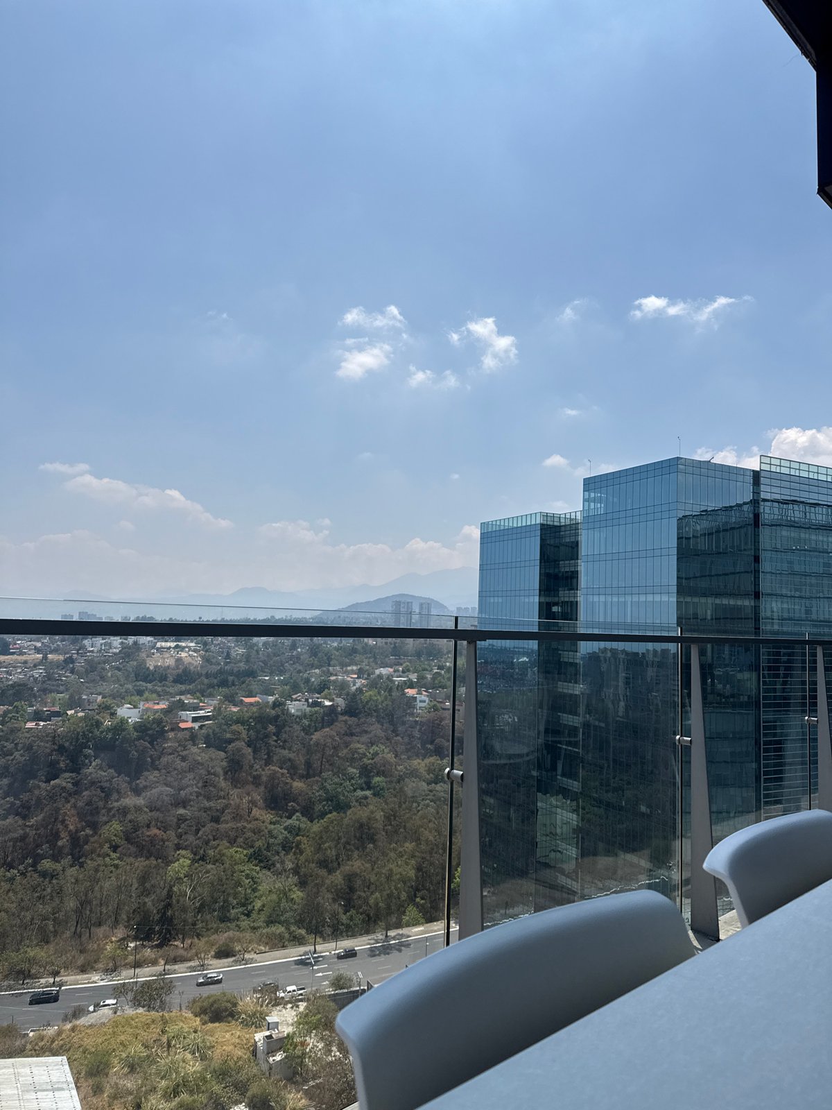 High-rise views captured of Mexico City skyline and mountains
