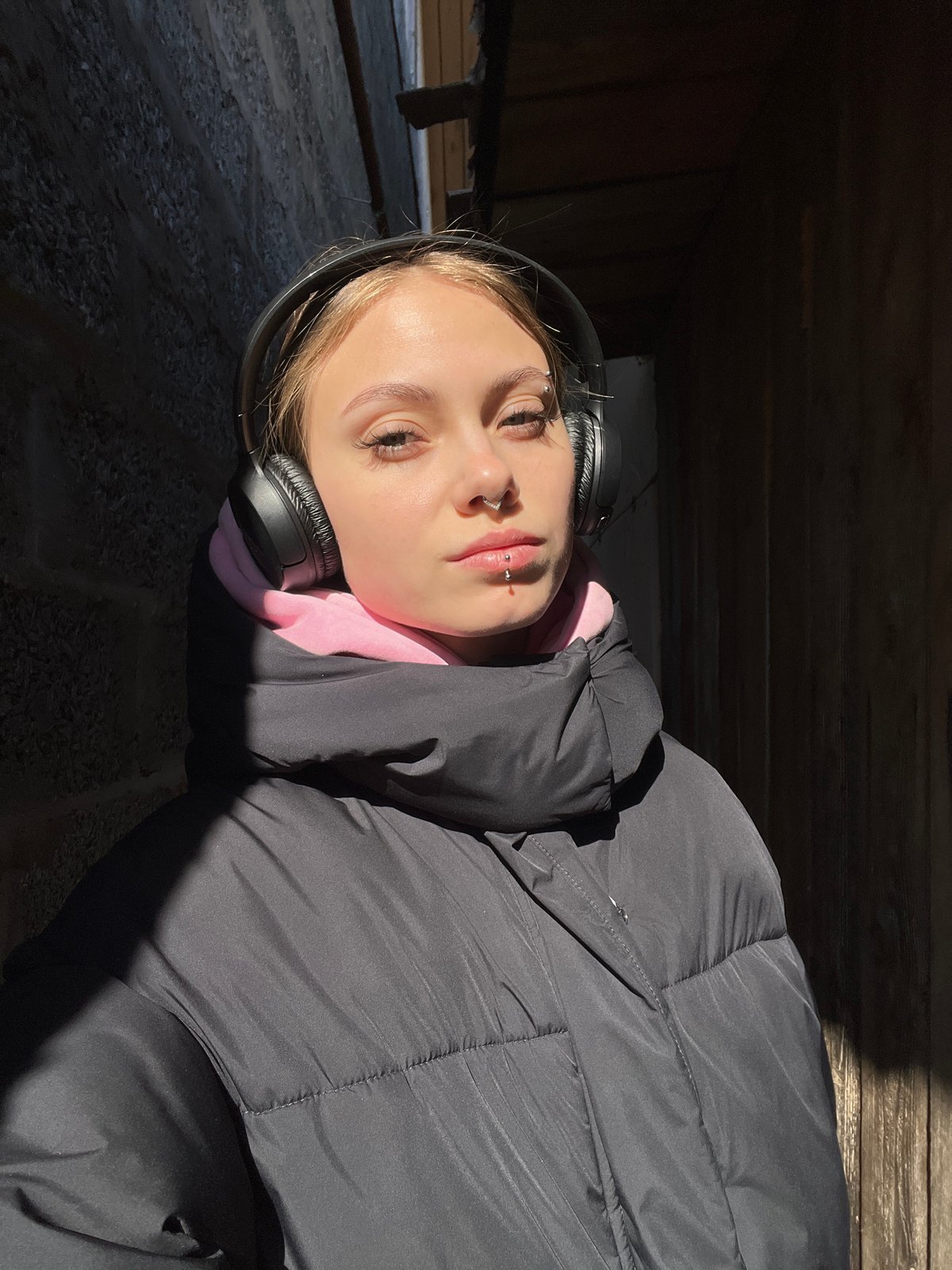 Person rests in morning sunlight near Foki, Russia