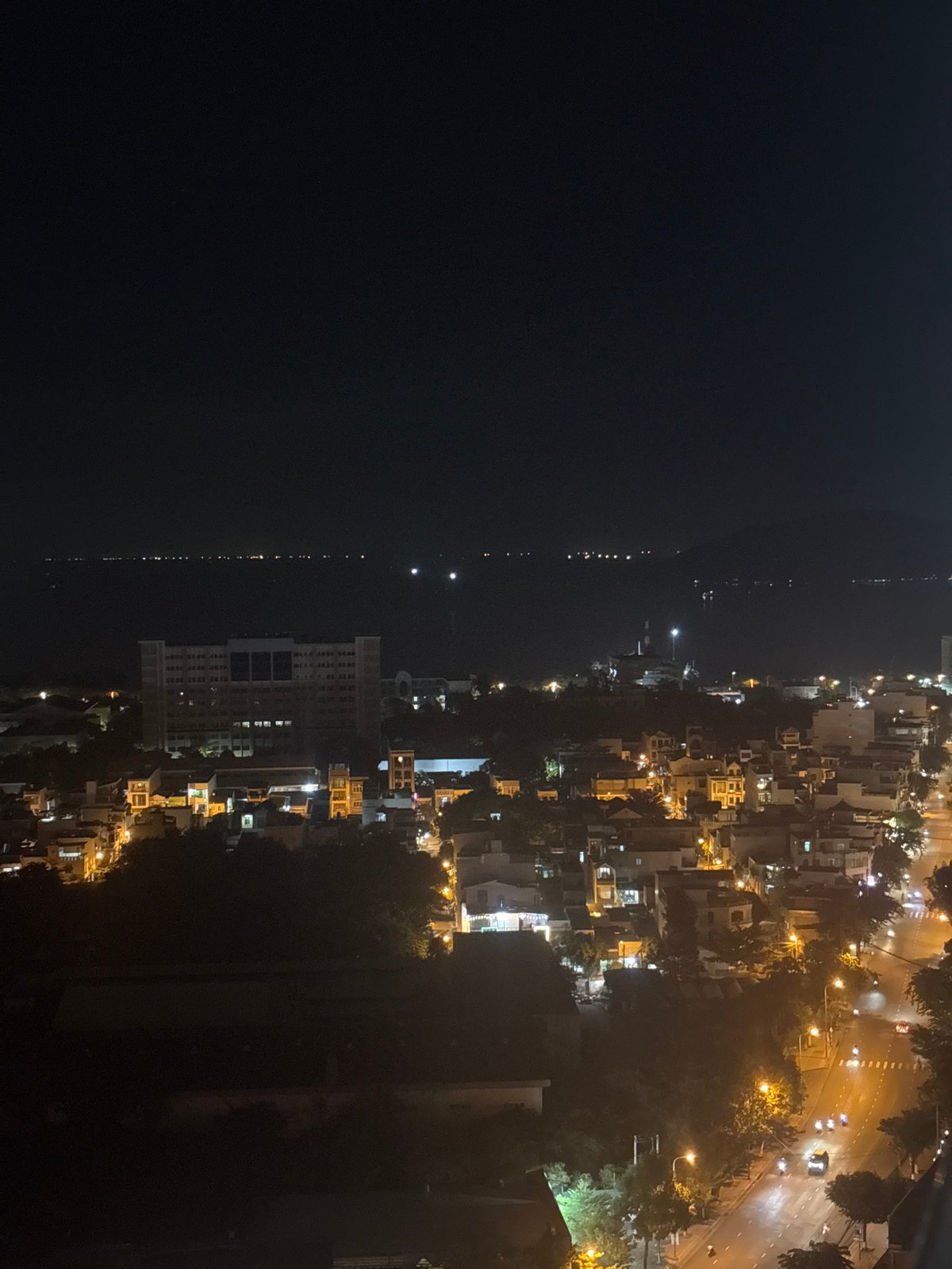 Nha Trang's nighttime coastline seen from above