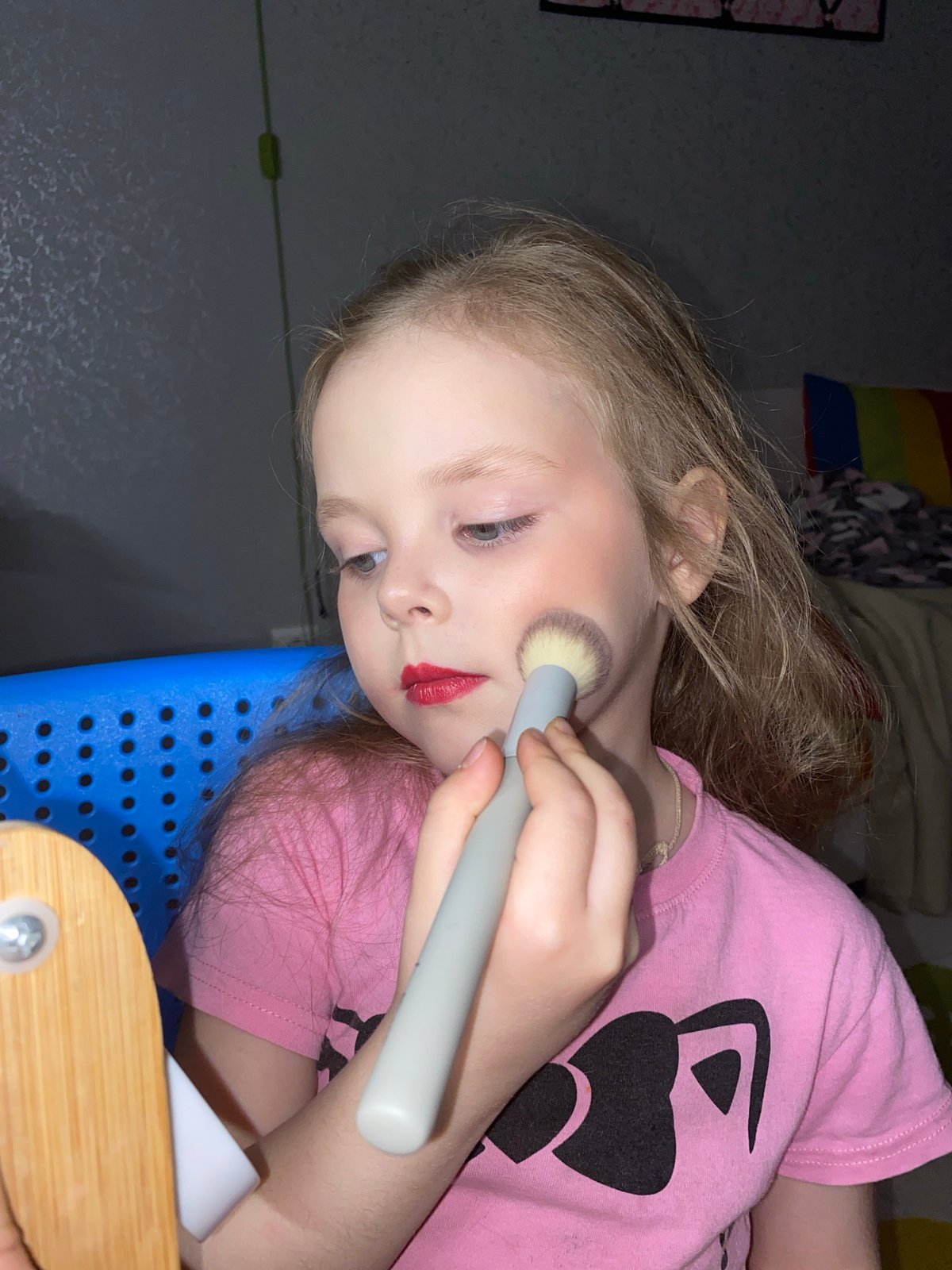 Child plays with makeup in Votkinsk home setting