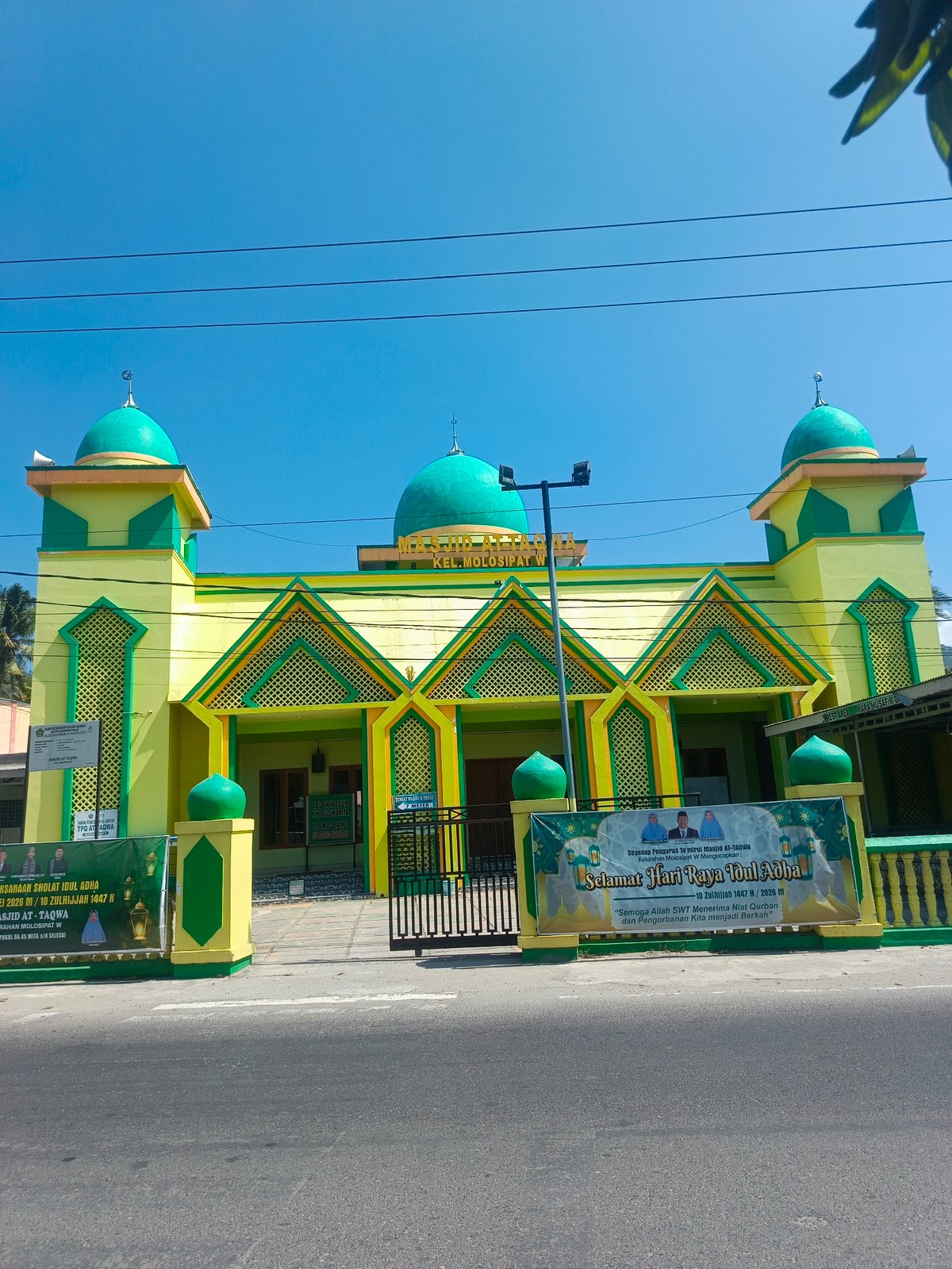 Mosque and tropical greenery in a Gorontalo neighborhood