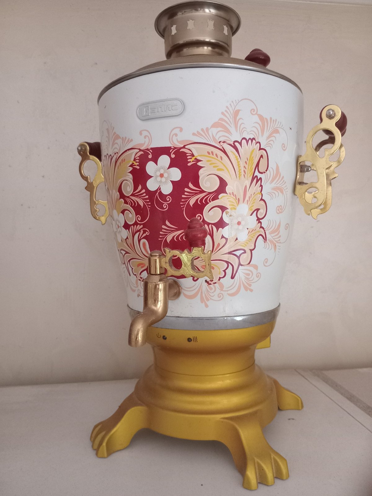 Folk art, ceramics, and collectibles photographed in a home setting