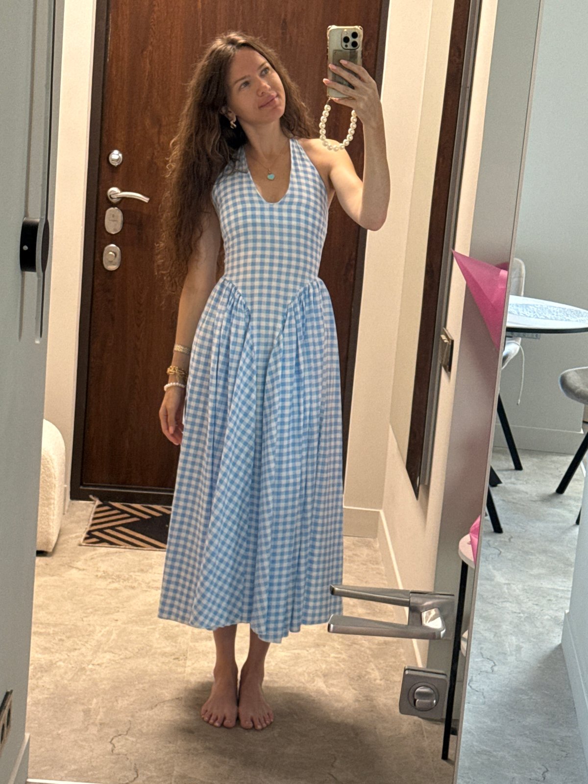 Mirror selfie in a Khimki doorway, summer 2026