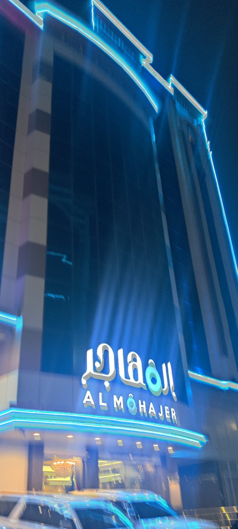 Nighttime urban documentation captures Jeddah's illuminated buildings and construction