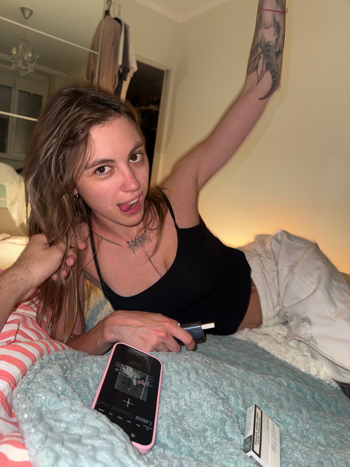 Casual bedroom self-portrait session in a Moscow apartment