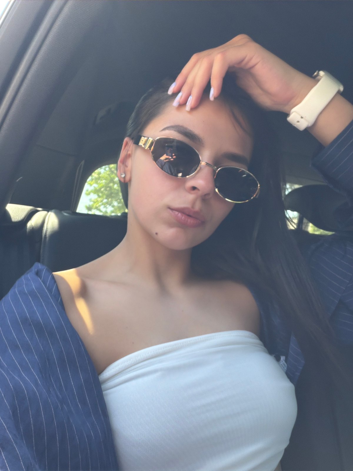 Woman in sunglasses photographed in car, Ruse Bulgaria
