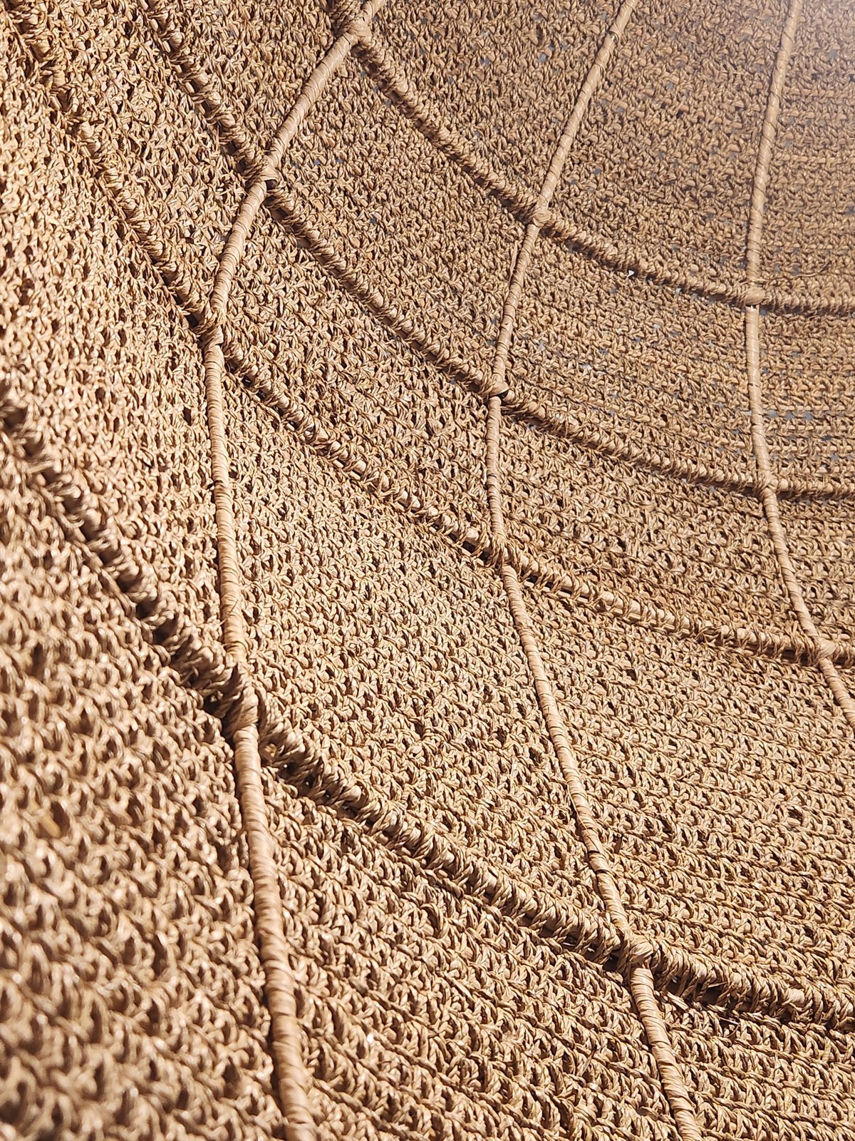 Browsing handcrafted masks, baskets, and woven decor in Maitland