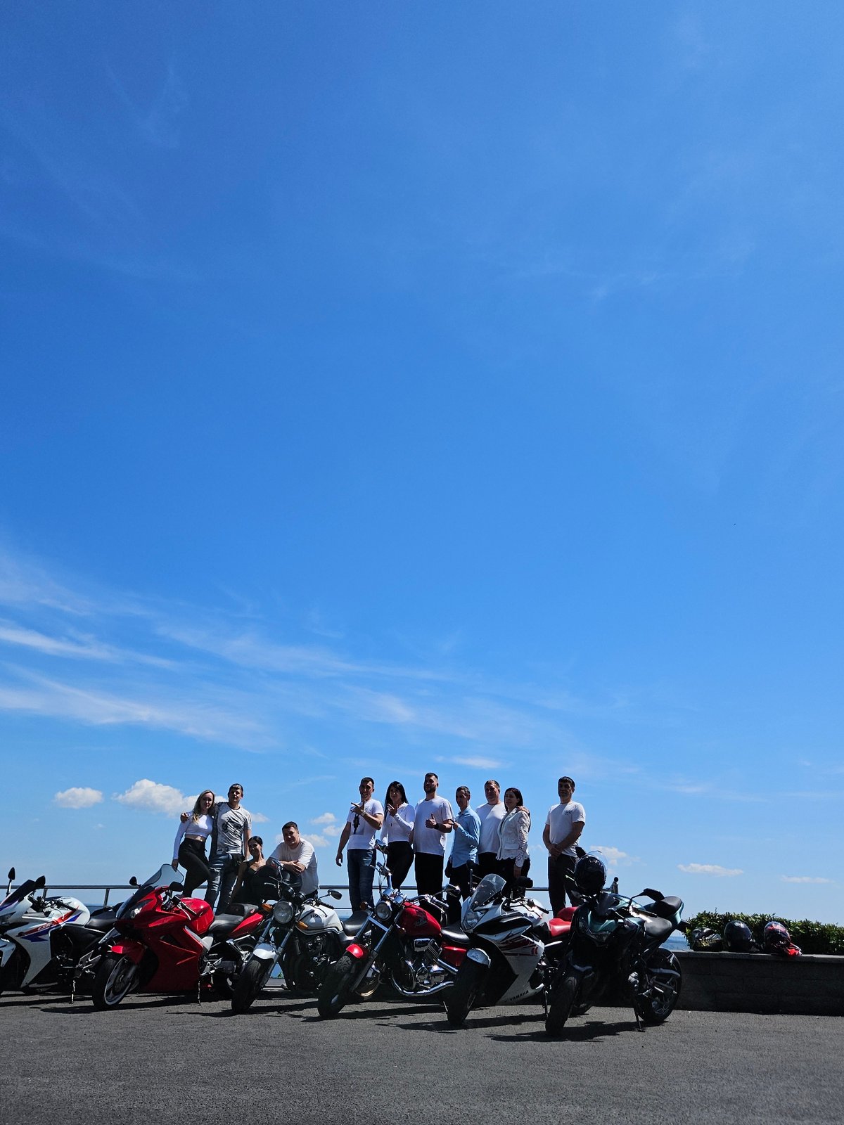 Motorcycle riders gather along Ulyanovsk waterfront on a summer morning