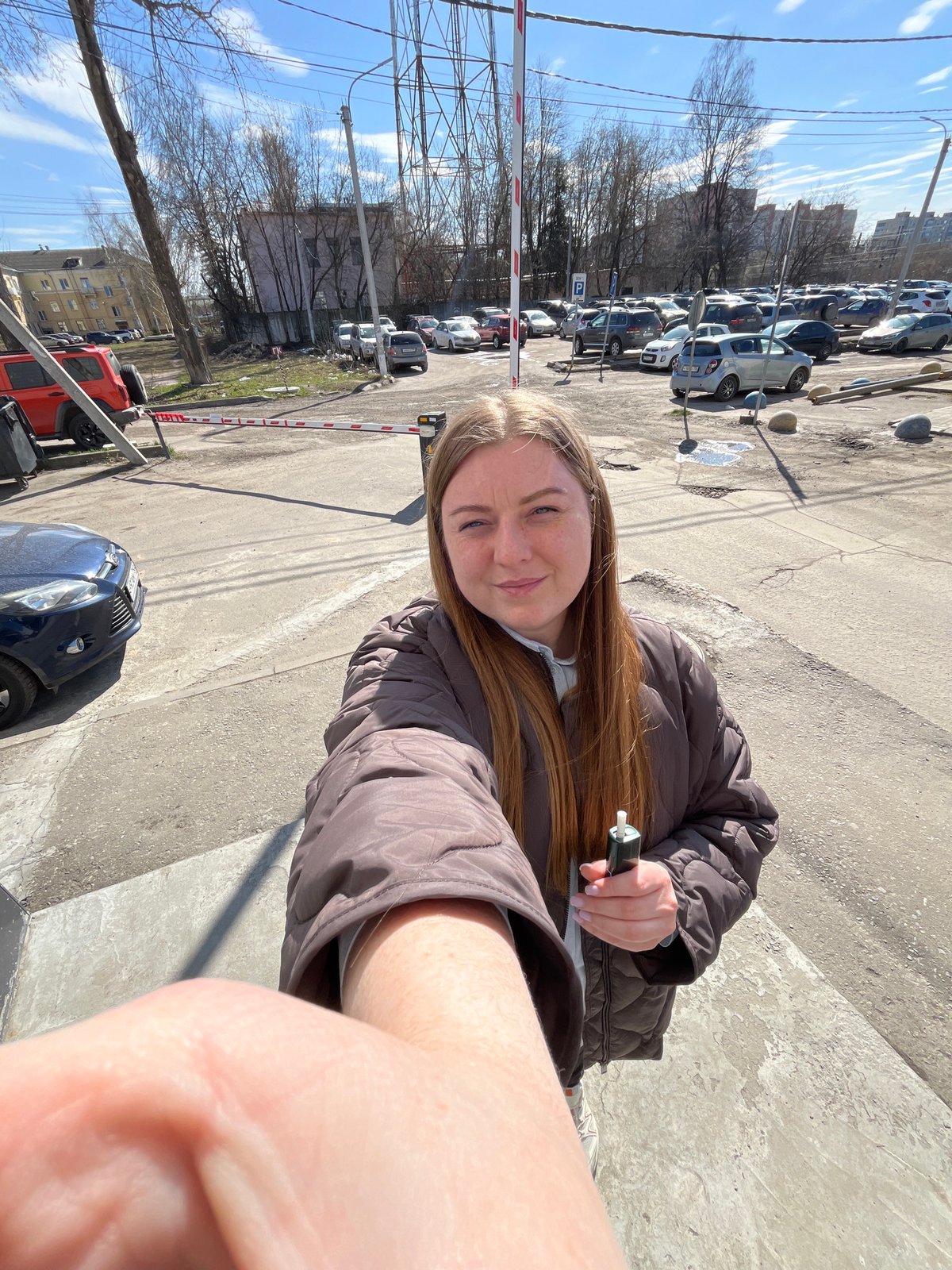 Woman photographed in street scenes around Klin, Russia