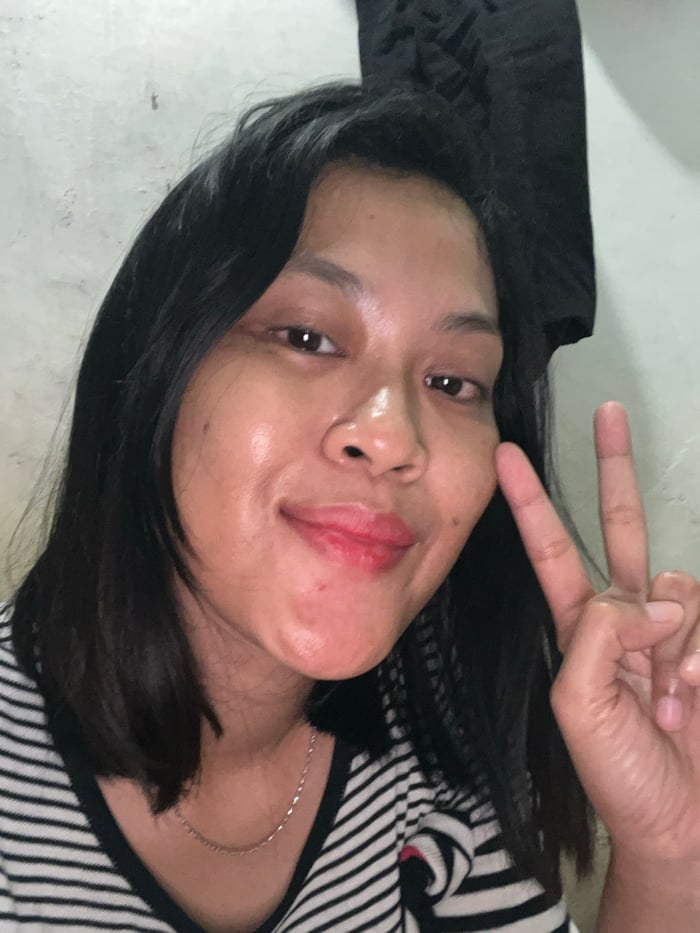Woman takes selfie session in Pati Indonesia late night