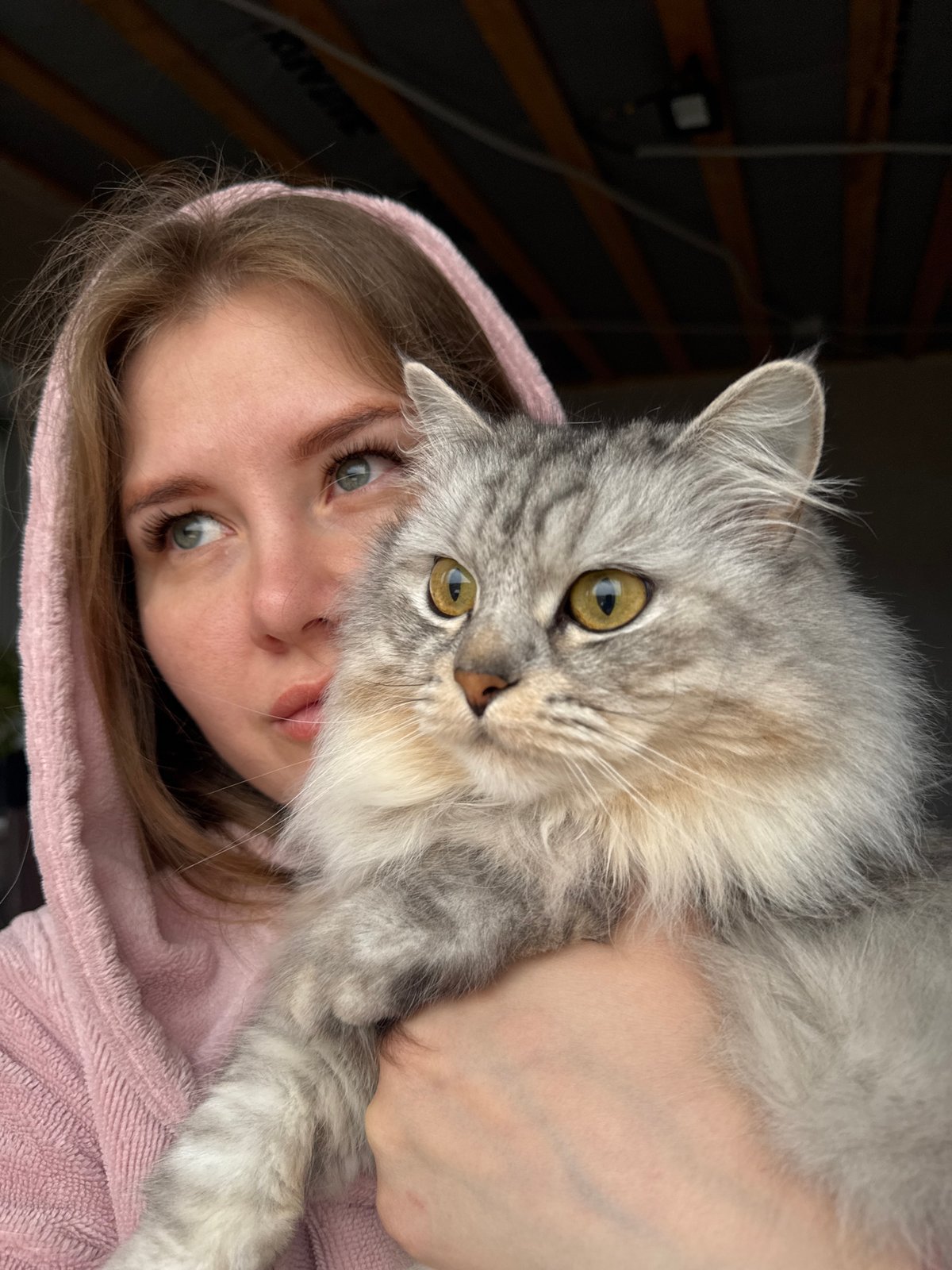 Woman photographed with cat in casual portraits, Gornyi Russia