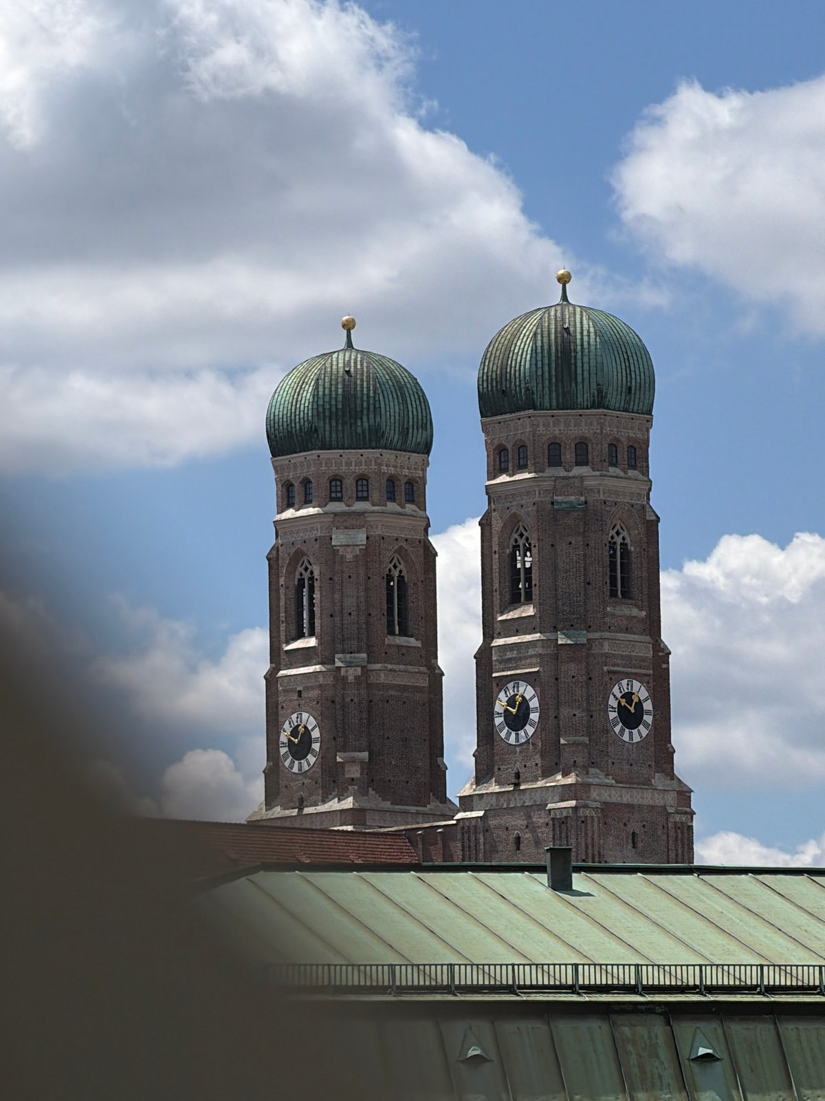 Frauenkirche twin domes rise above Munich rooftops