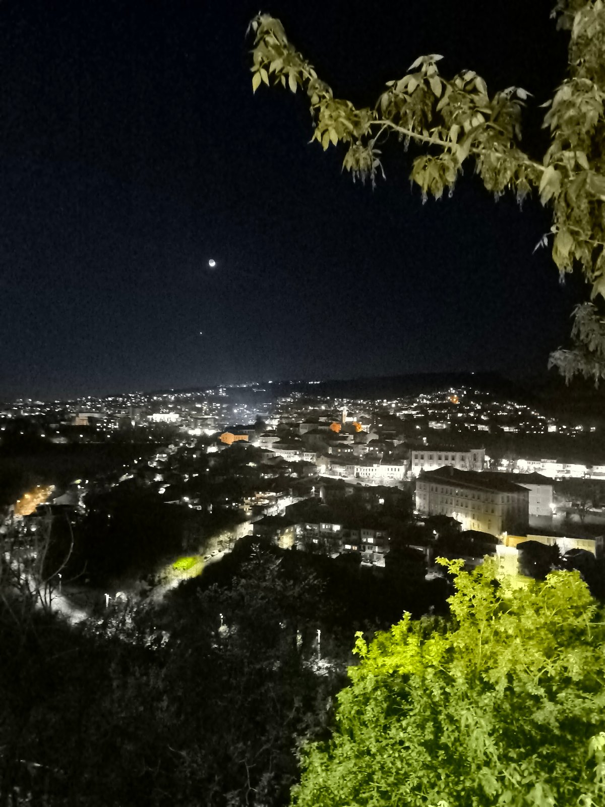 Nighttime cityscape captured from elevated view in Veliko Tarnovo