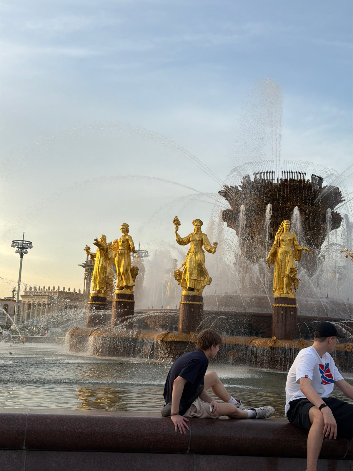 Spring afternoon at Moscow's VDNKh draws couples, lilac admirers