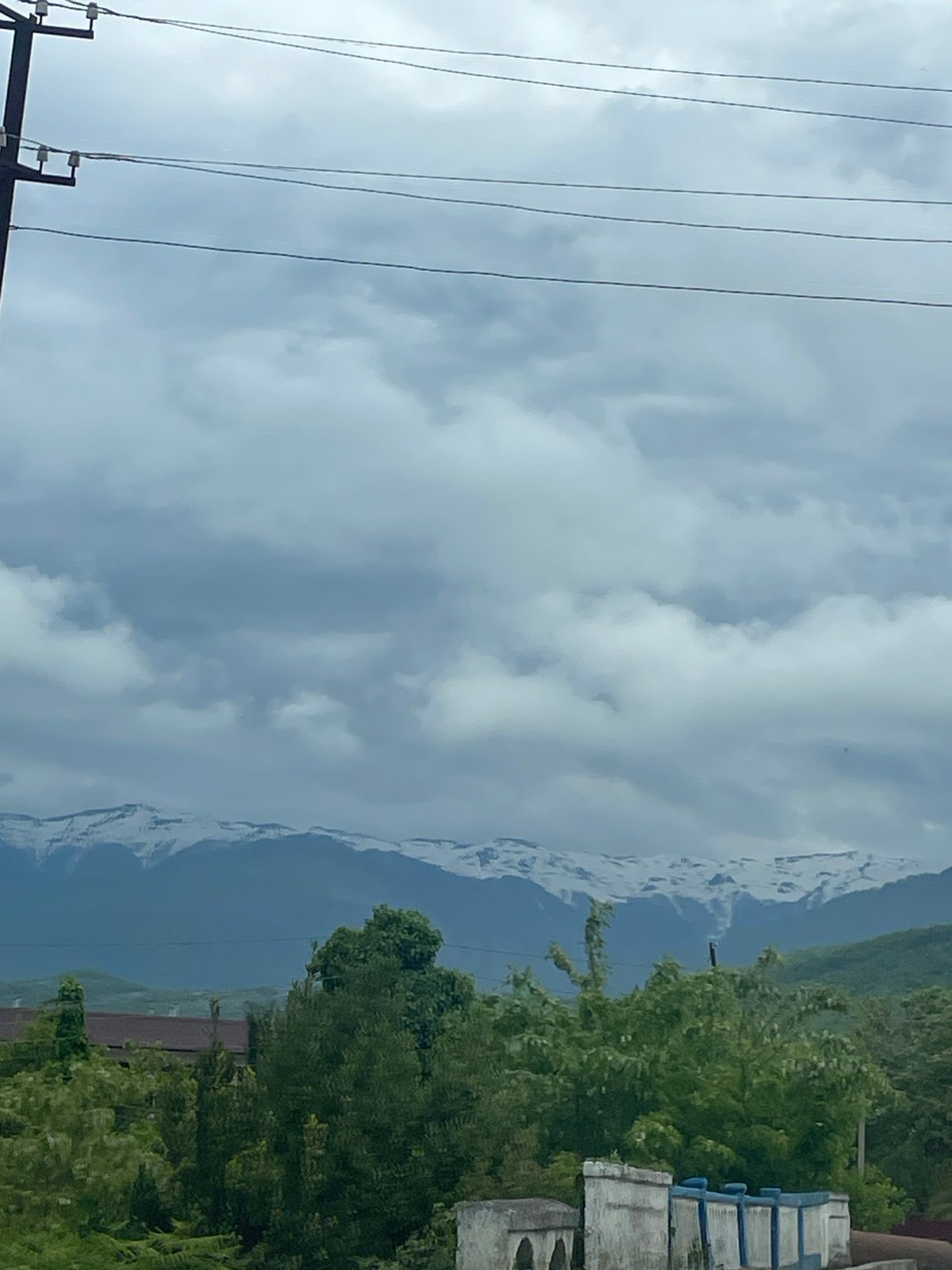 Cloudy skies documented over Tsandrypsh, Abkhazia mountain town