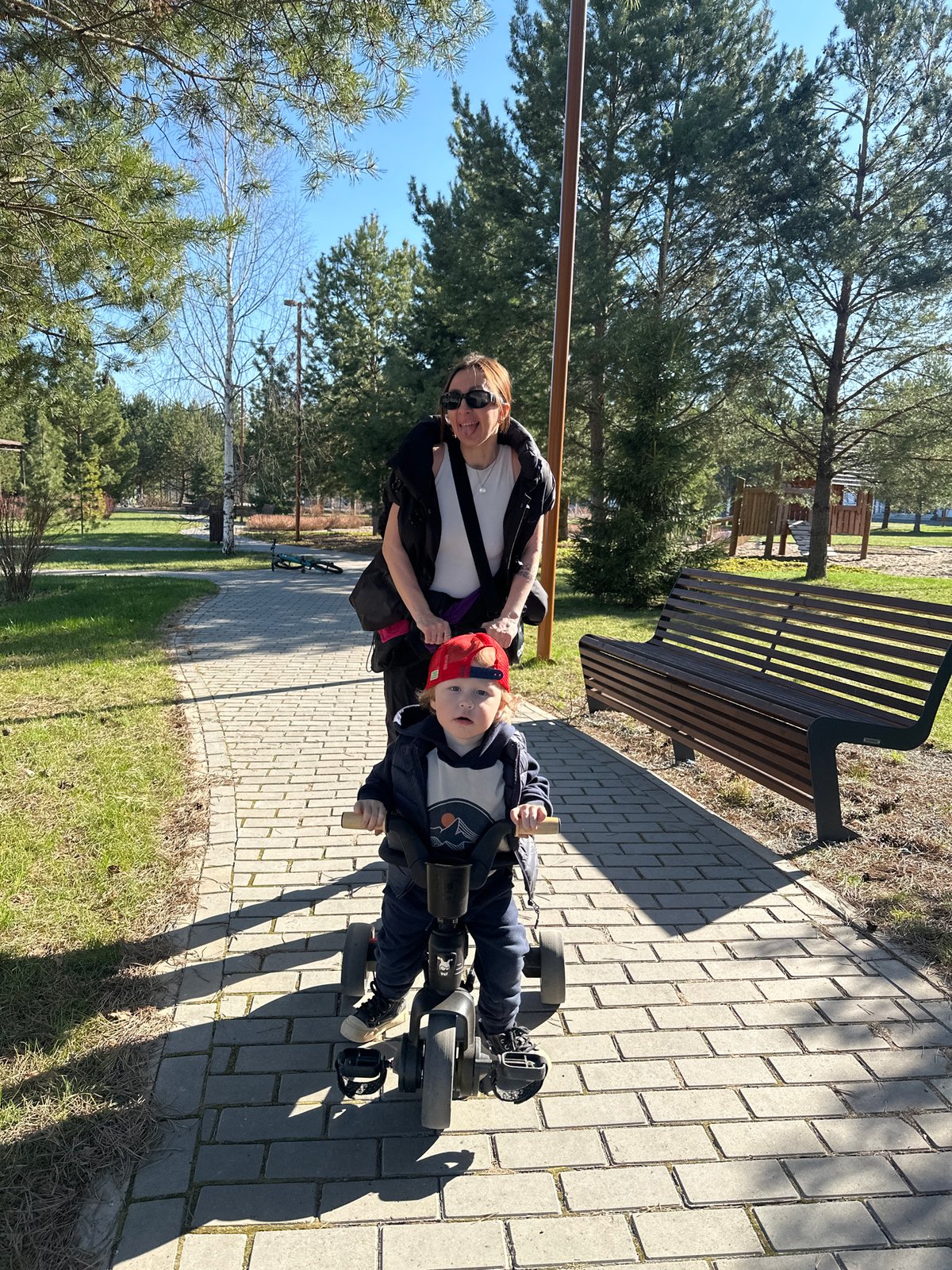 Family playground outing documented in Russian village park