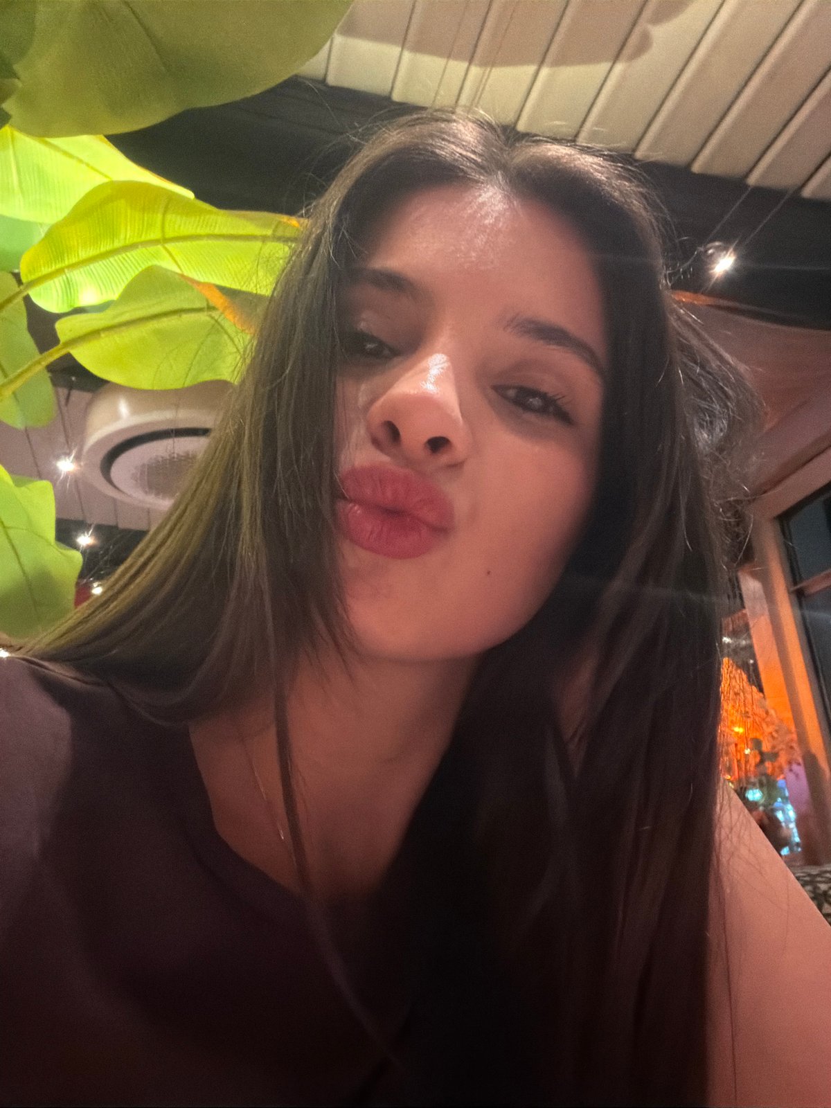 Woman documents dining and shopping experience in Sofia