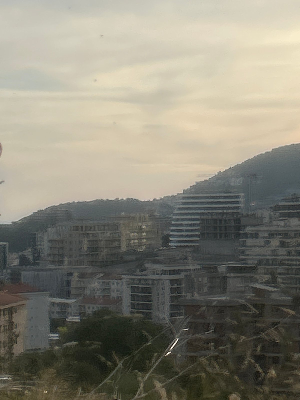 Sunset over Rafailovići's coastline, shot from a hillside vantage