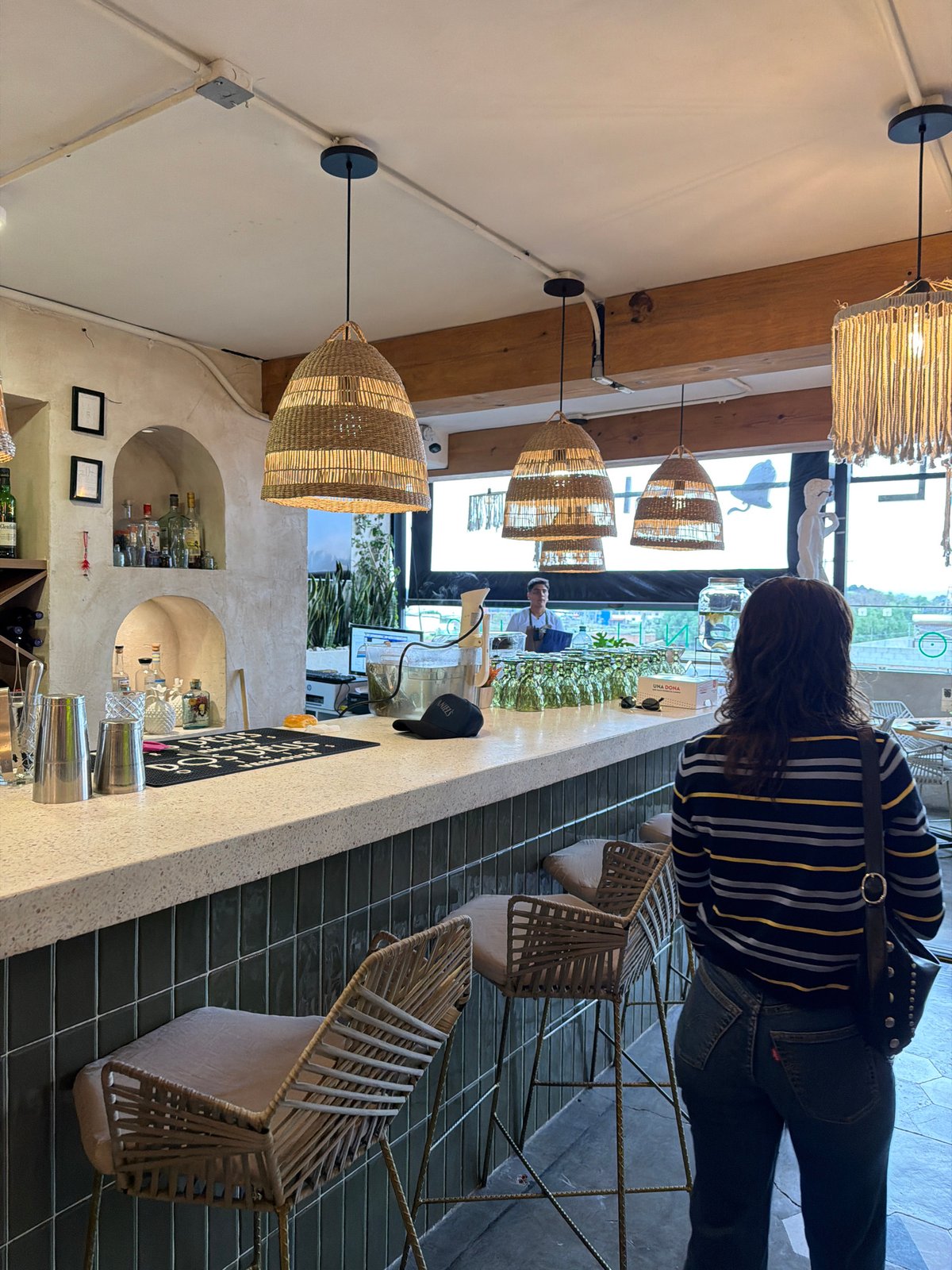 Evening scenes captured in Cholula: bar interior, pyramid view