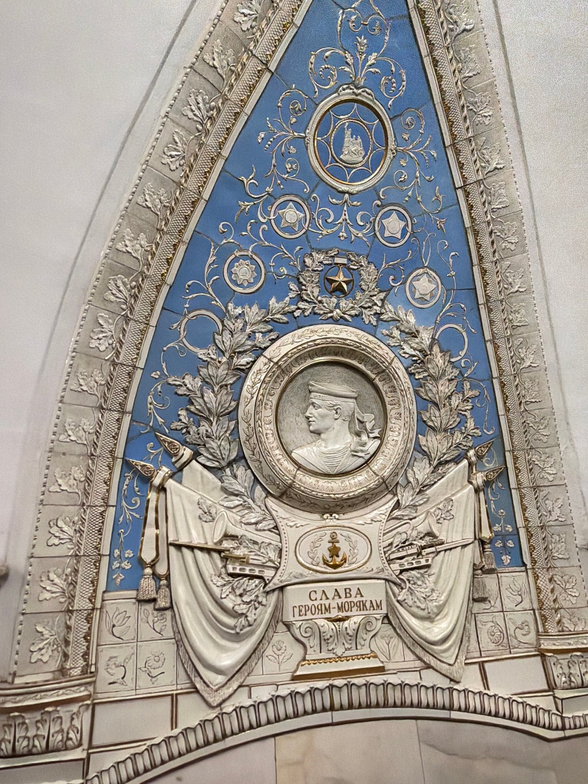 Ornate triangular tile panel documented in Moscow