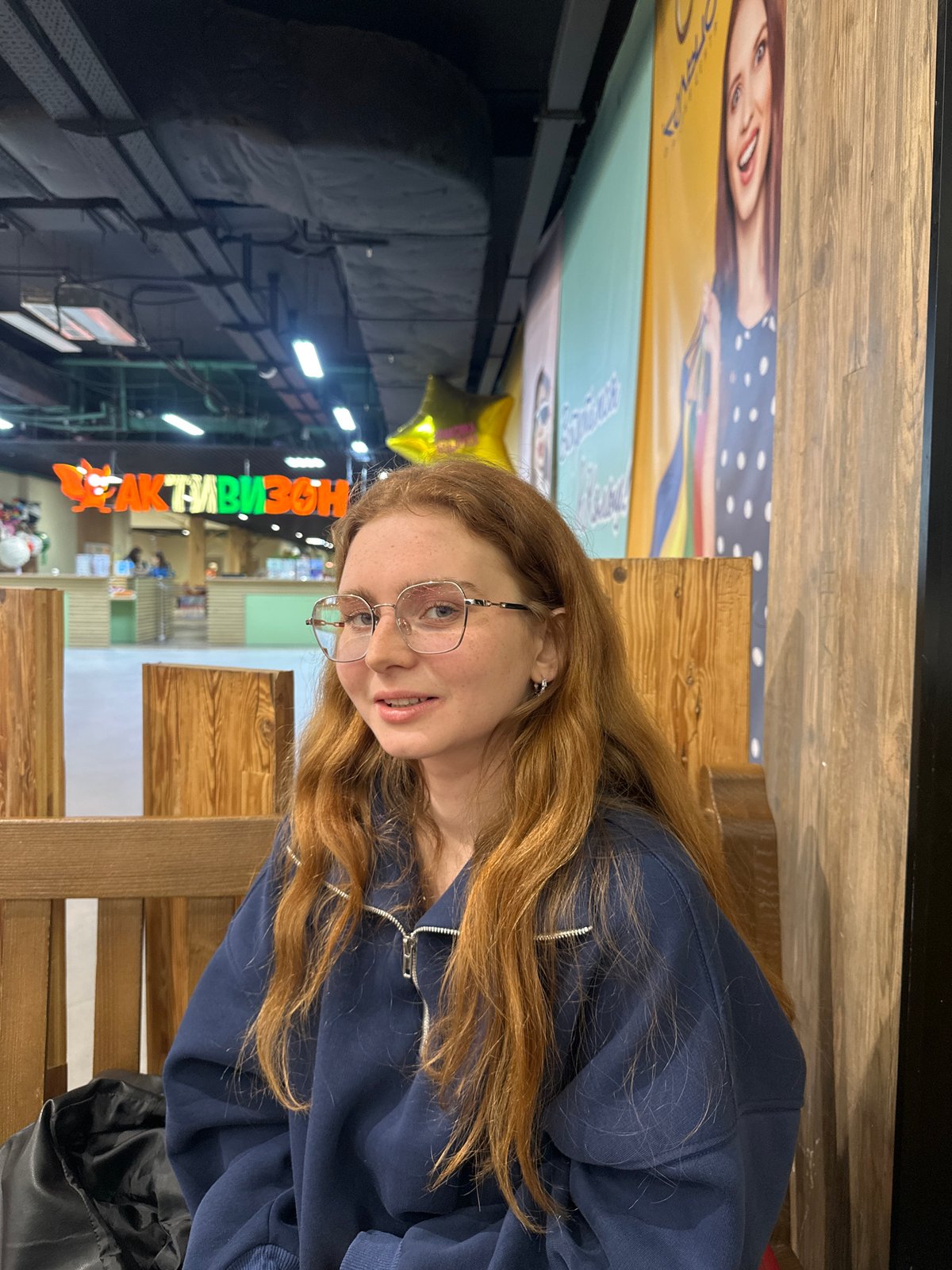 Woman dines alone at Kazan fast-food restaurant
