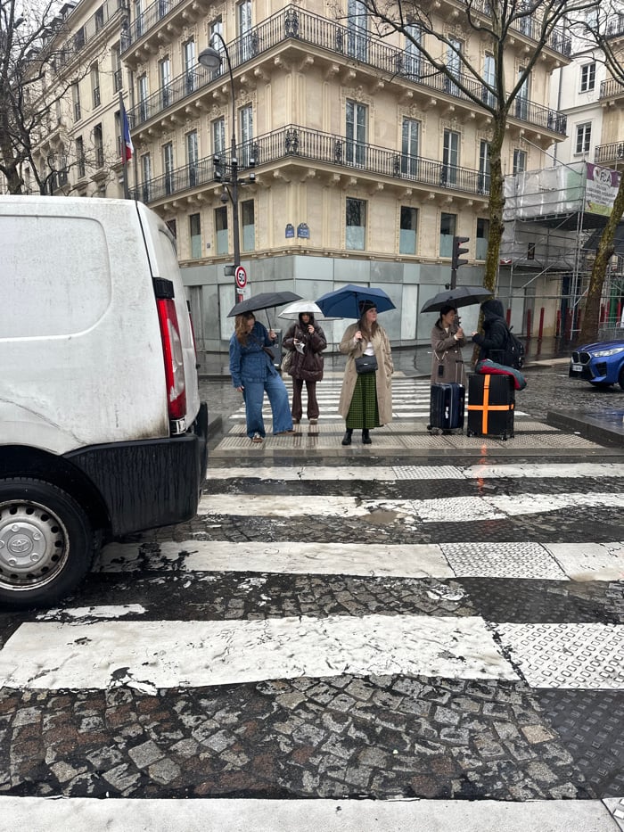 Parisian daily life fragments captured across rainy streets and workspaces