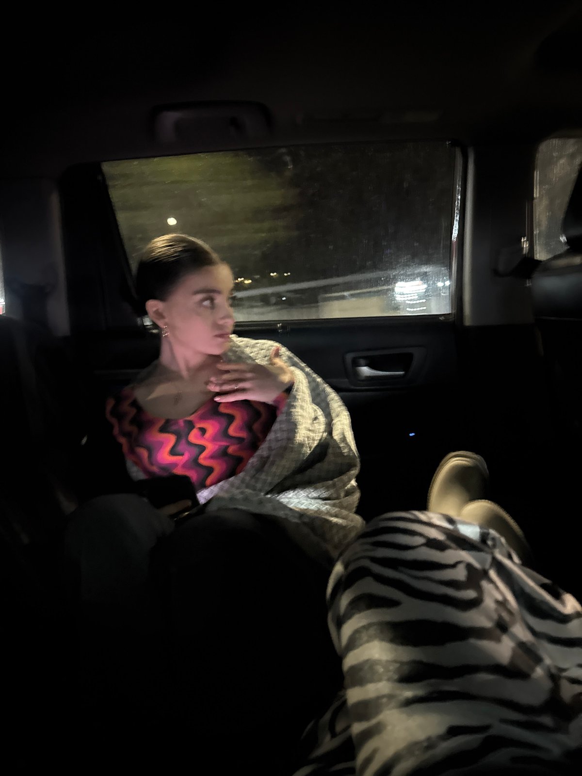 Woman observed in vehicle interior in Verin Ptghni, Armenia