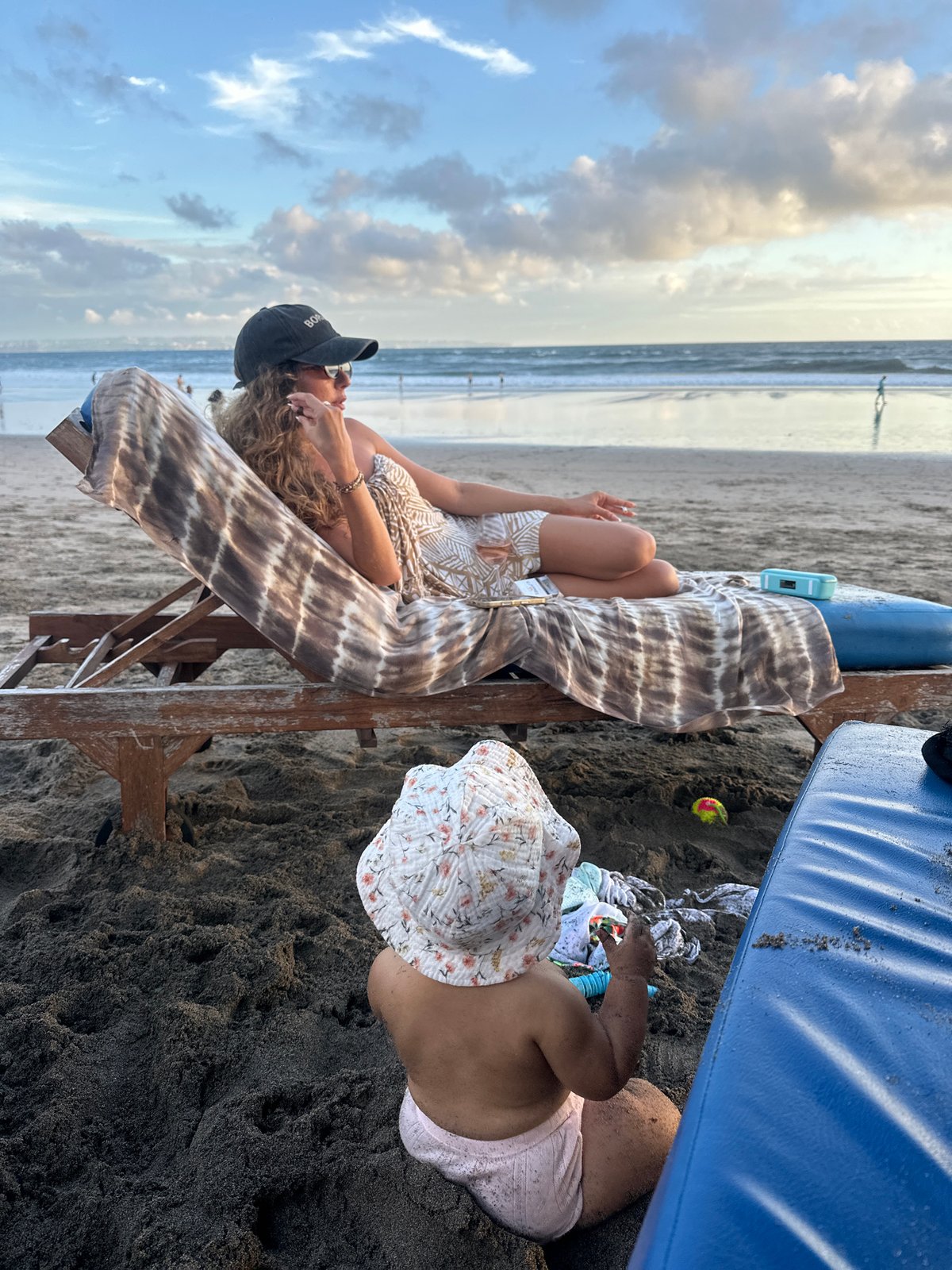 Woman enjoys morning beach time with dog in North Kuta