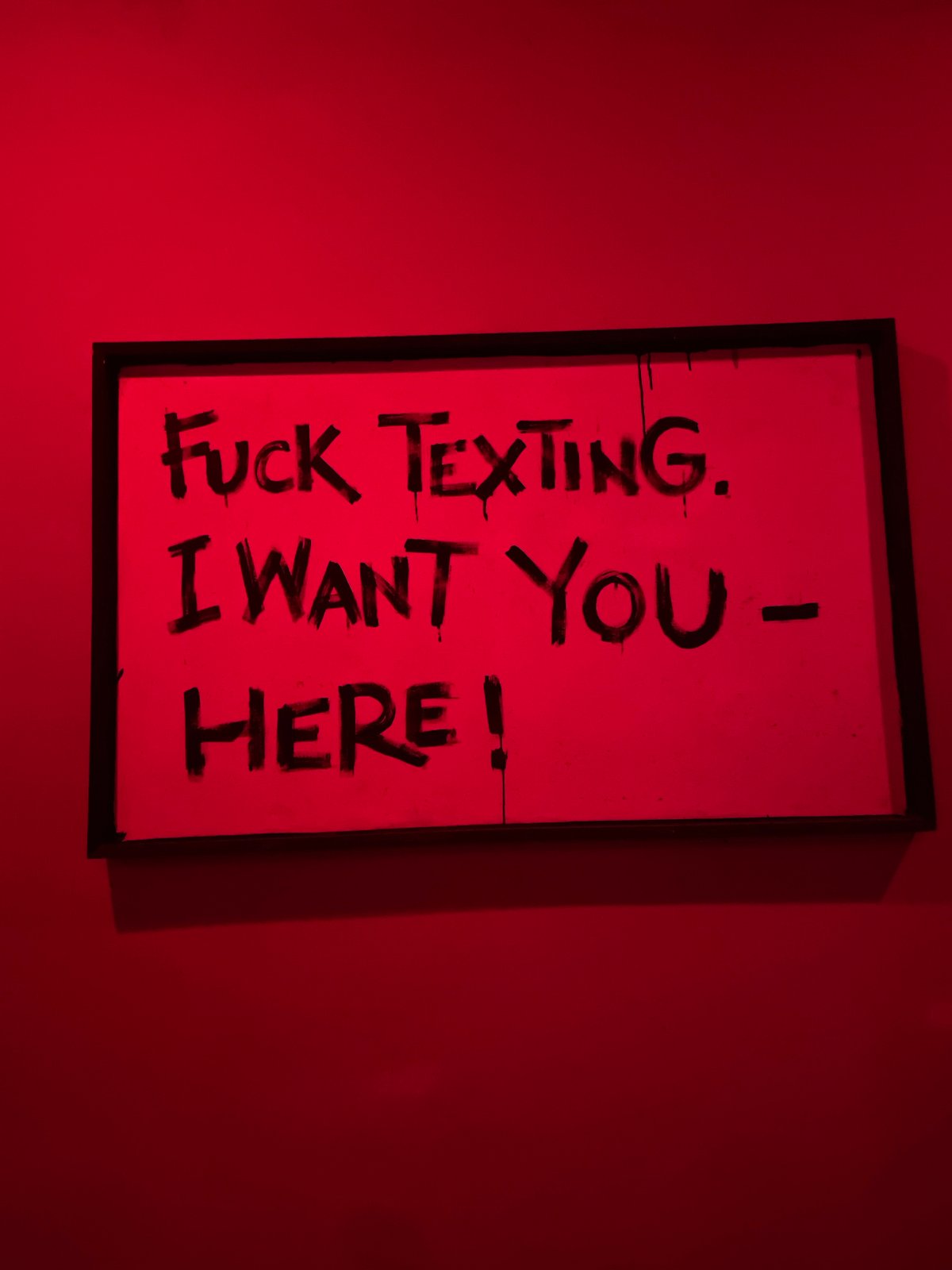 Anti-texting sign spotted on wall in North Kuta, Indonesia
