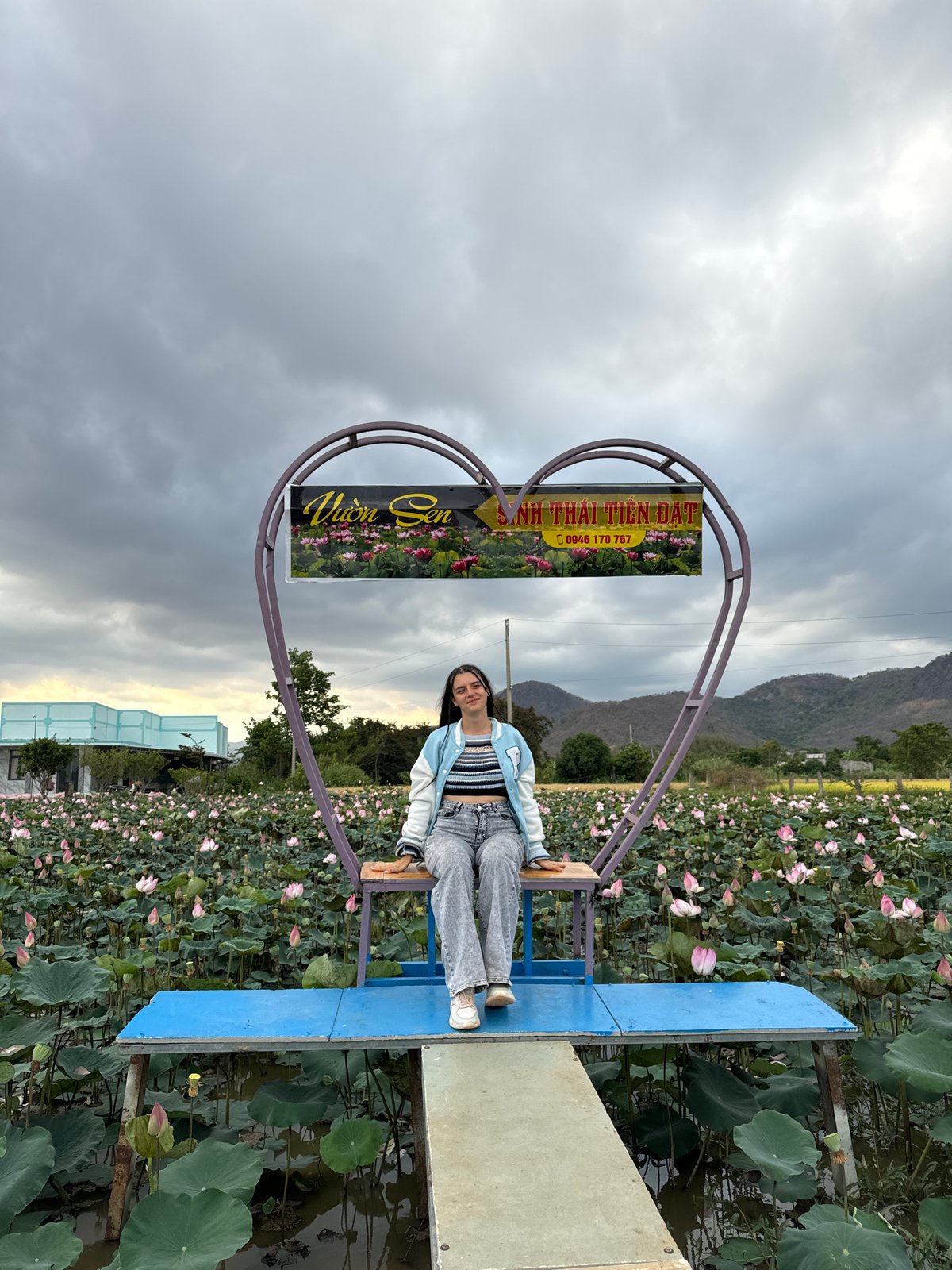 Tourist visits lotus garden attraction in Ham Thuan Bac