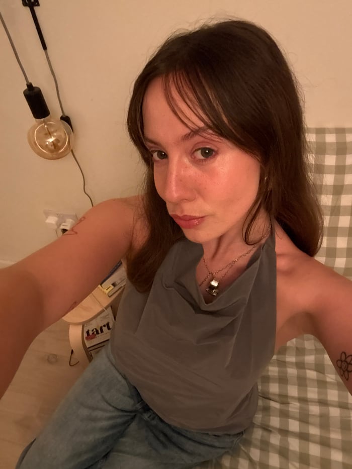 Woman documents personal selfie session across London residence
