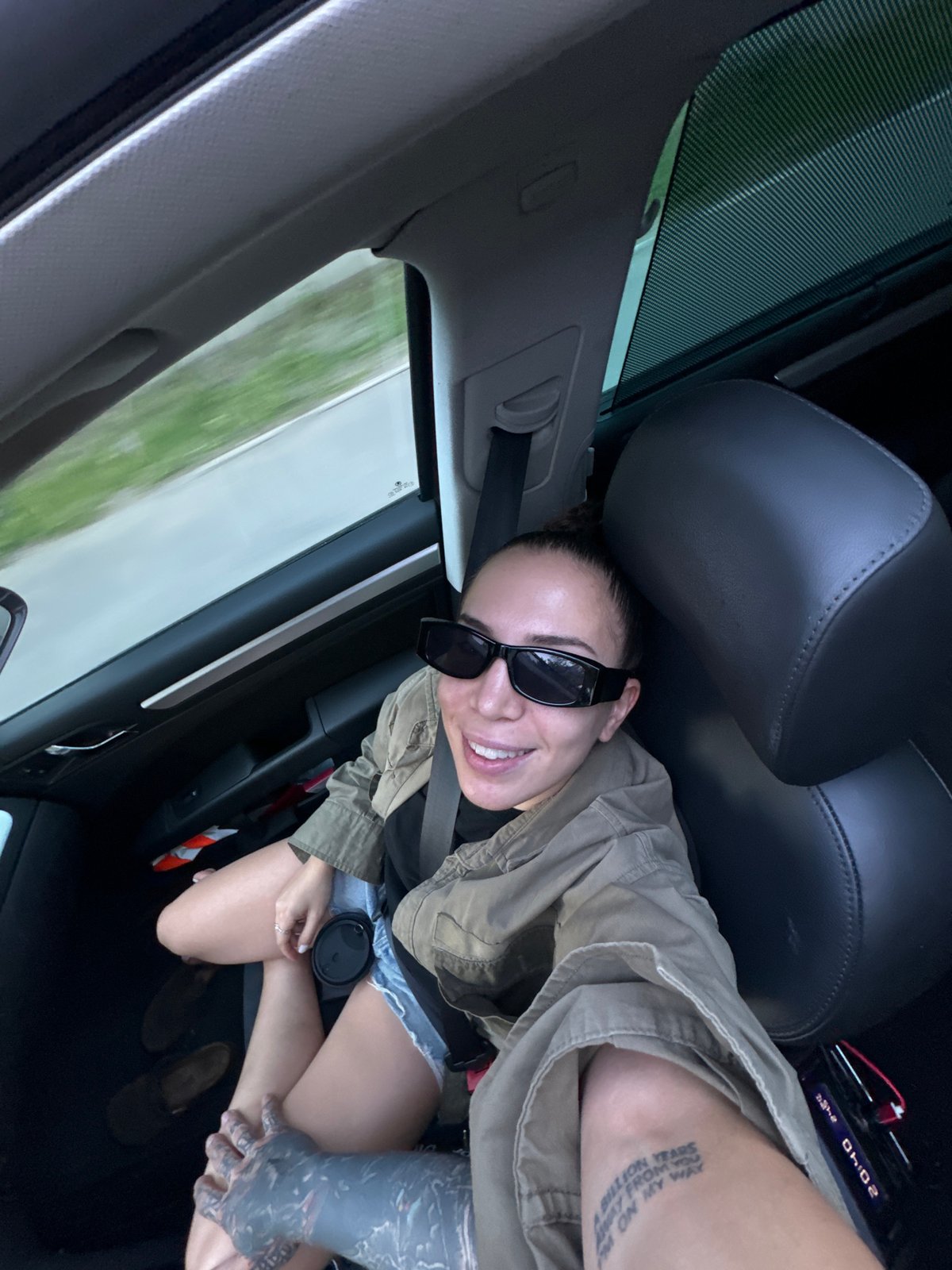 Sunny car ride near Moscow, sunroof open, good vibes