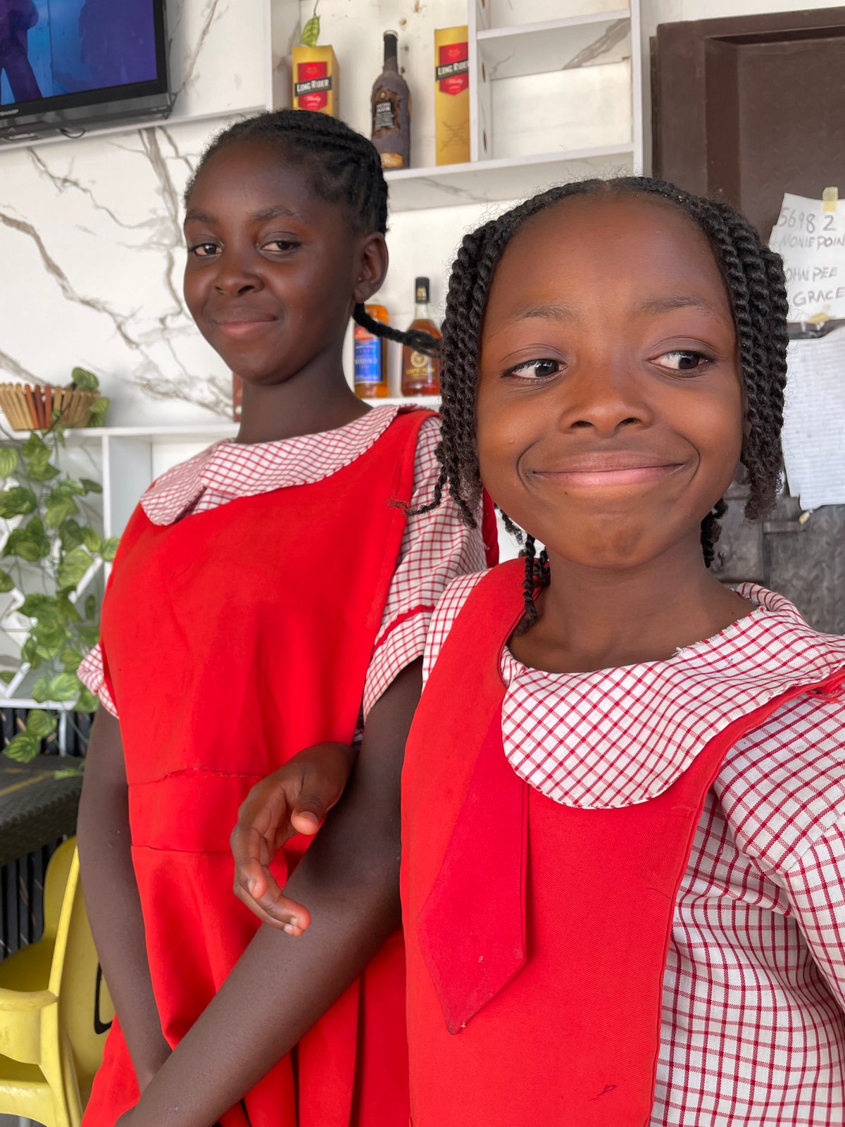 Community life documented in Nigerian village over afternoon hours