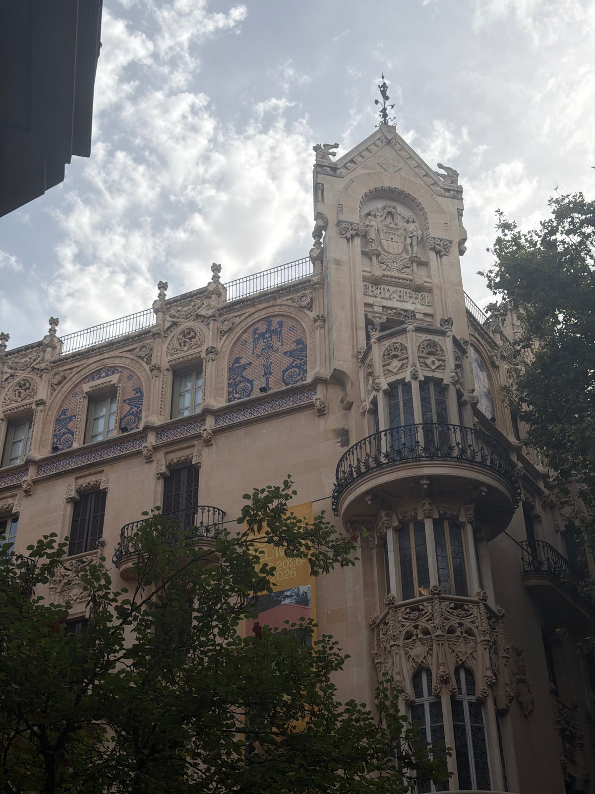 Historic architecture and morning street life in central Palma