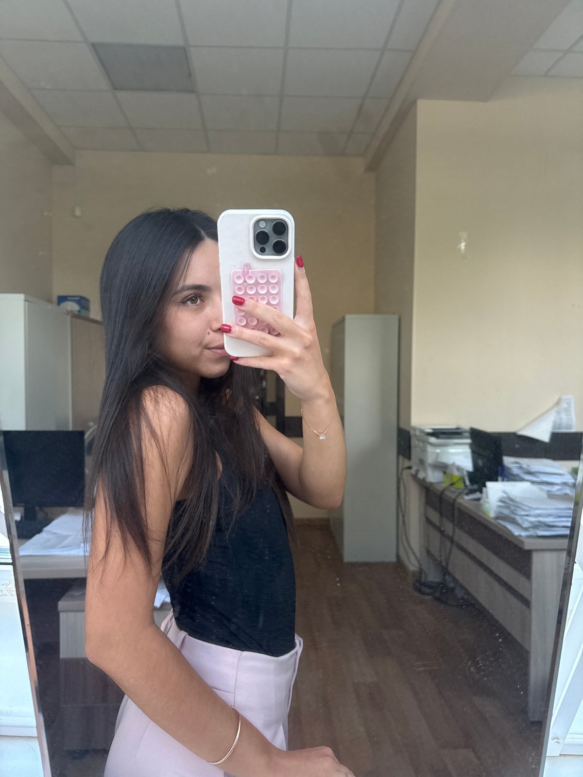 Mirror selfie series, outfit variations, indoor setting