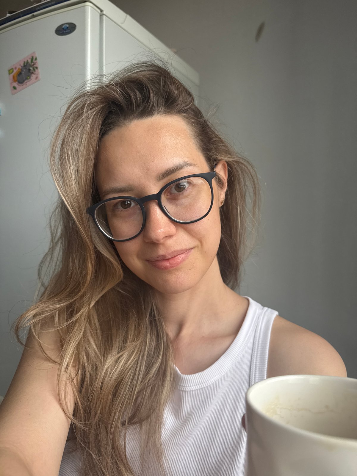 Woman photographed with coffee mug in early morning Chaikovsky session