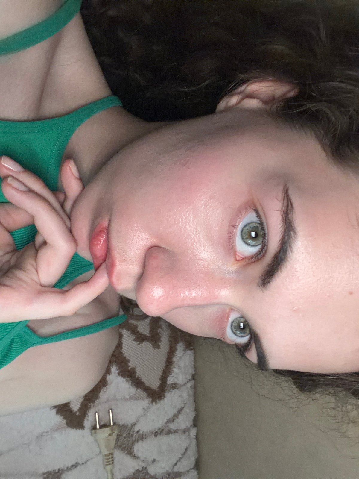 Casual indoor selfie session on a couch in Tyumen