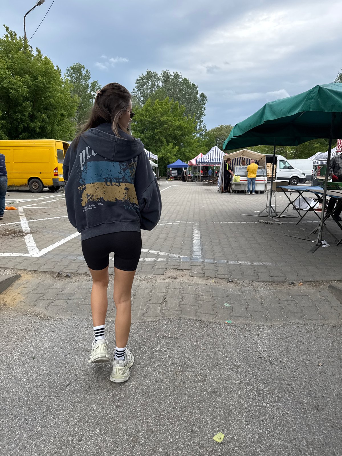 Woman in casual wear observed in car and parking area