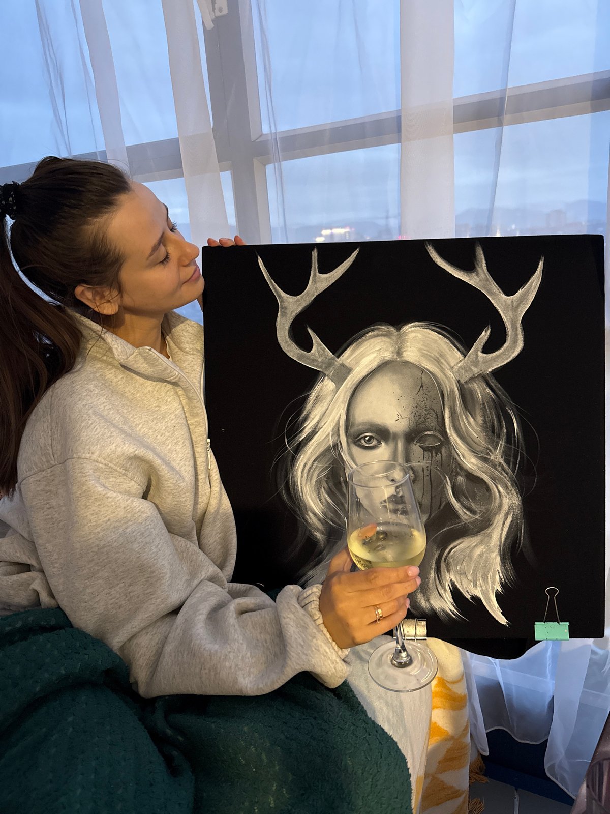 Artist creates portrait drawings with wine in Krasnoyarsk studio