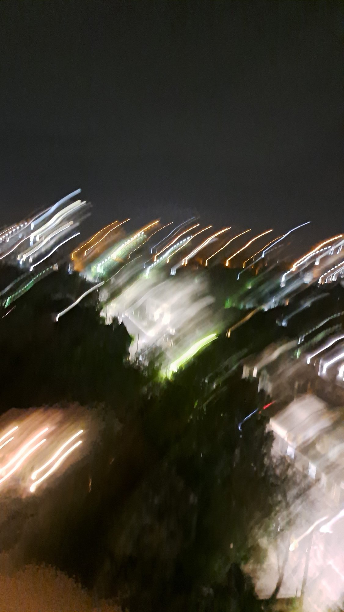 Nighttime residential area captured from elevated views