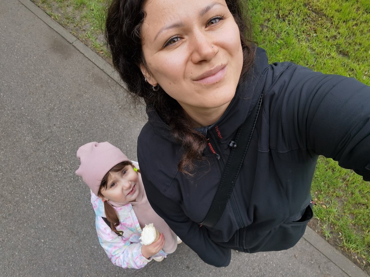 Woman and girl enjoy morning park outing in Perm