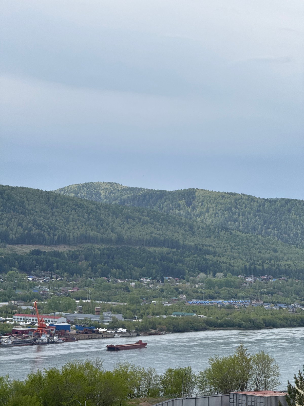 Aerial view captures Yenisei River through Krasnoyarsk cityscape