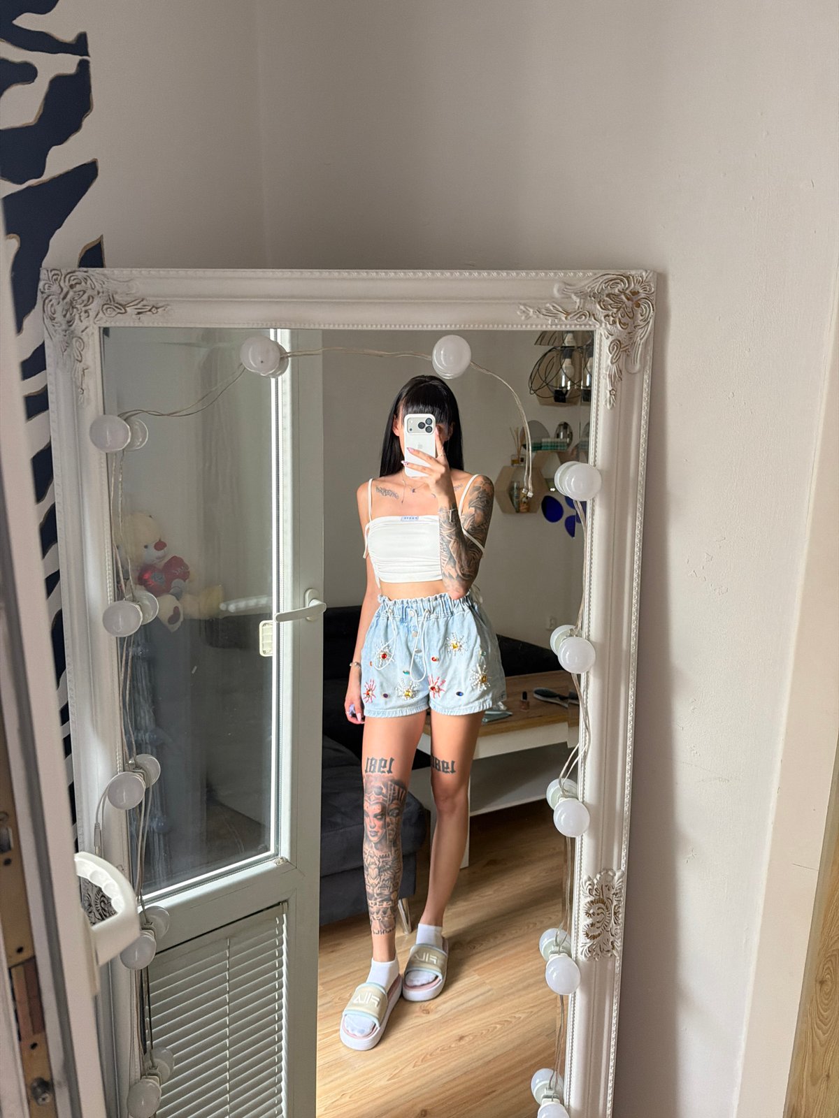 Mirror selfie session in Plovdiv, embellished denim and tattoos