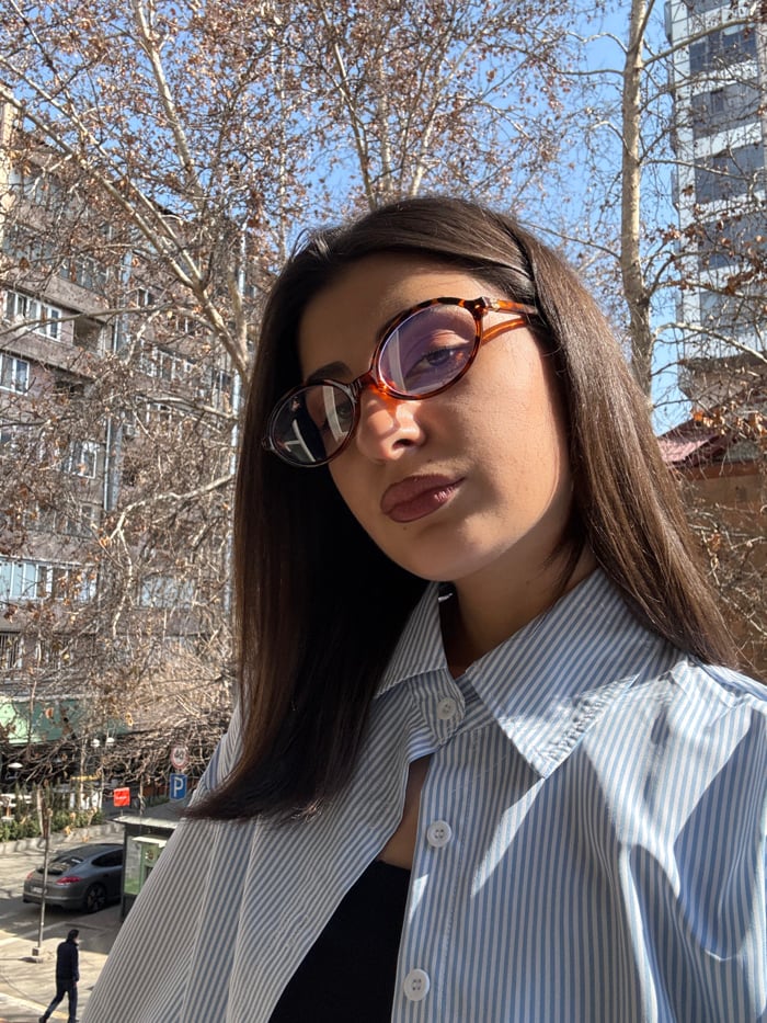 Woman documented in multiple locations across Yerevan morning hours