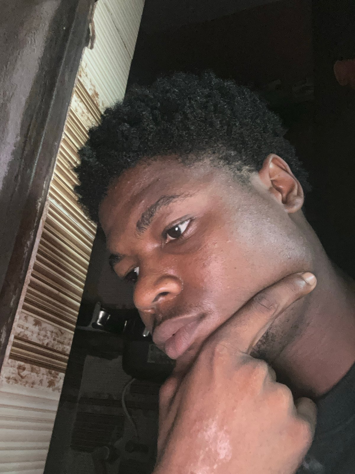 Close-up portrait series, chin-on-hand pose, Ihiagwa Nigeria